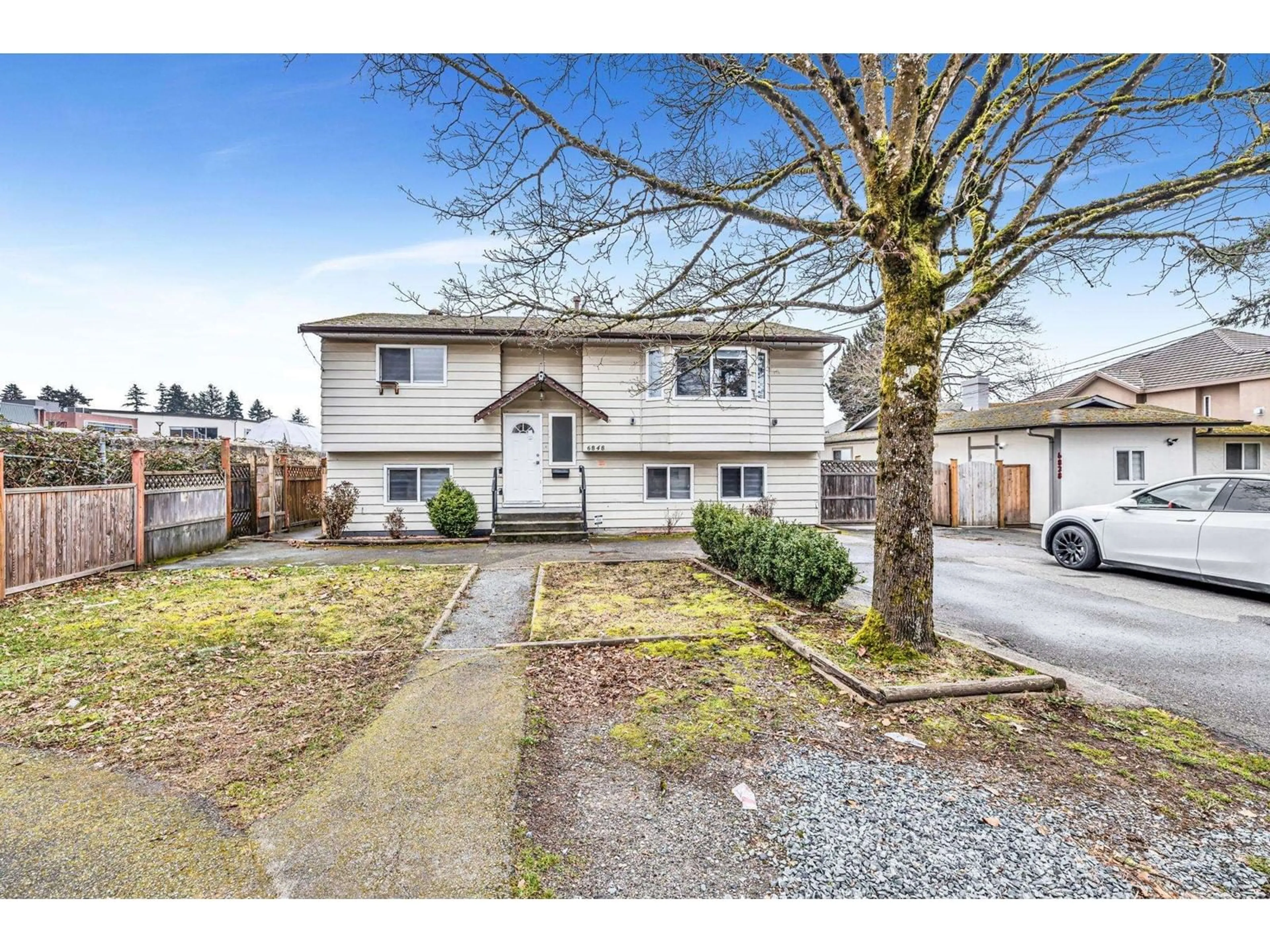 A pic from outside/outdoor area/front of a property/back of a property/a pic from drone, street for 6848 135, Surrey British Columbia V3W4W6