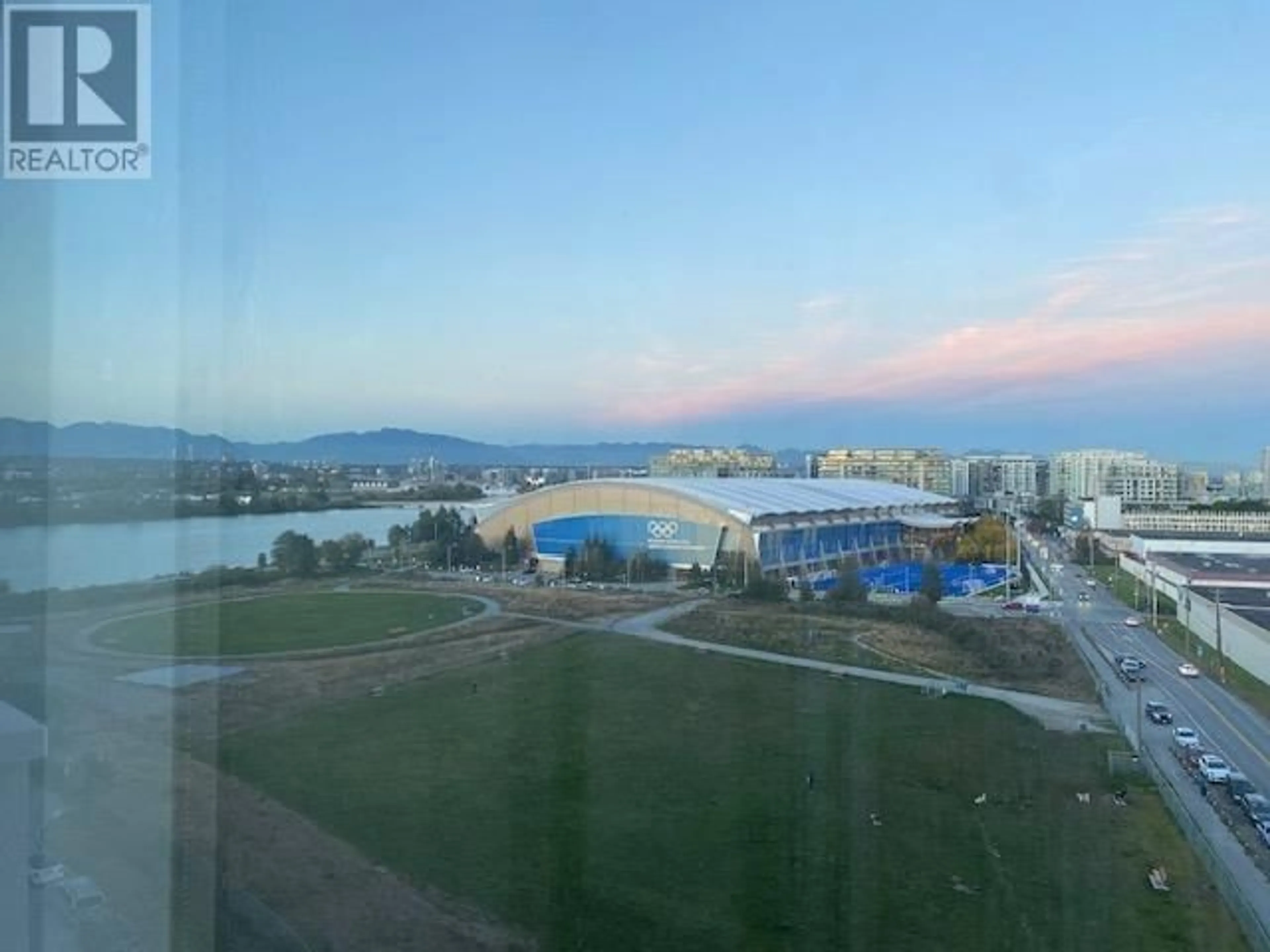 A pic from outside/outdoor area/front of a property/back of a property/a pic from drone, mountain view for 905 - 5199 BRIGHOUSE WAY, Richmond British Columbia V7C0A7