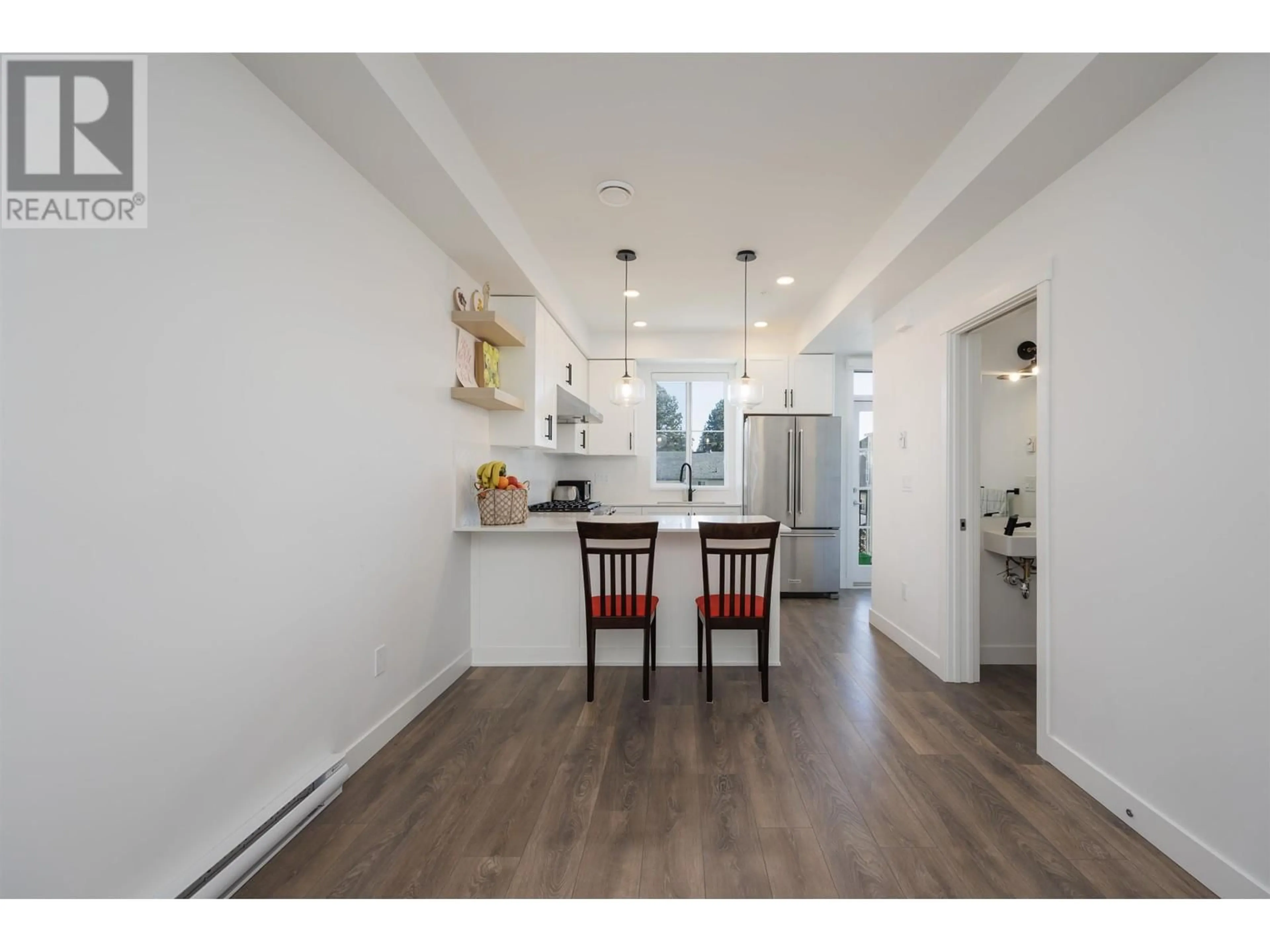 Open concept kitchen, wood/laminate floor for 119 707 ROBINSON STREET, Coquitlam British Columbia V3J0M9