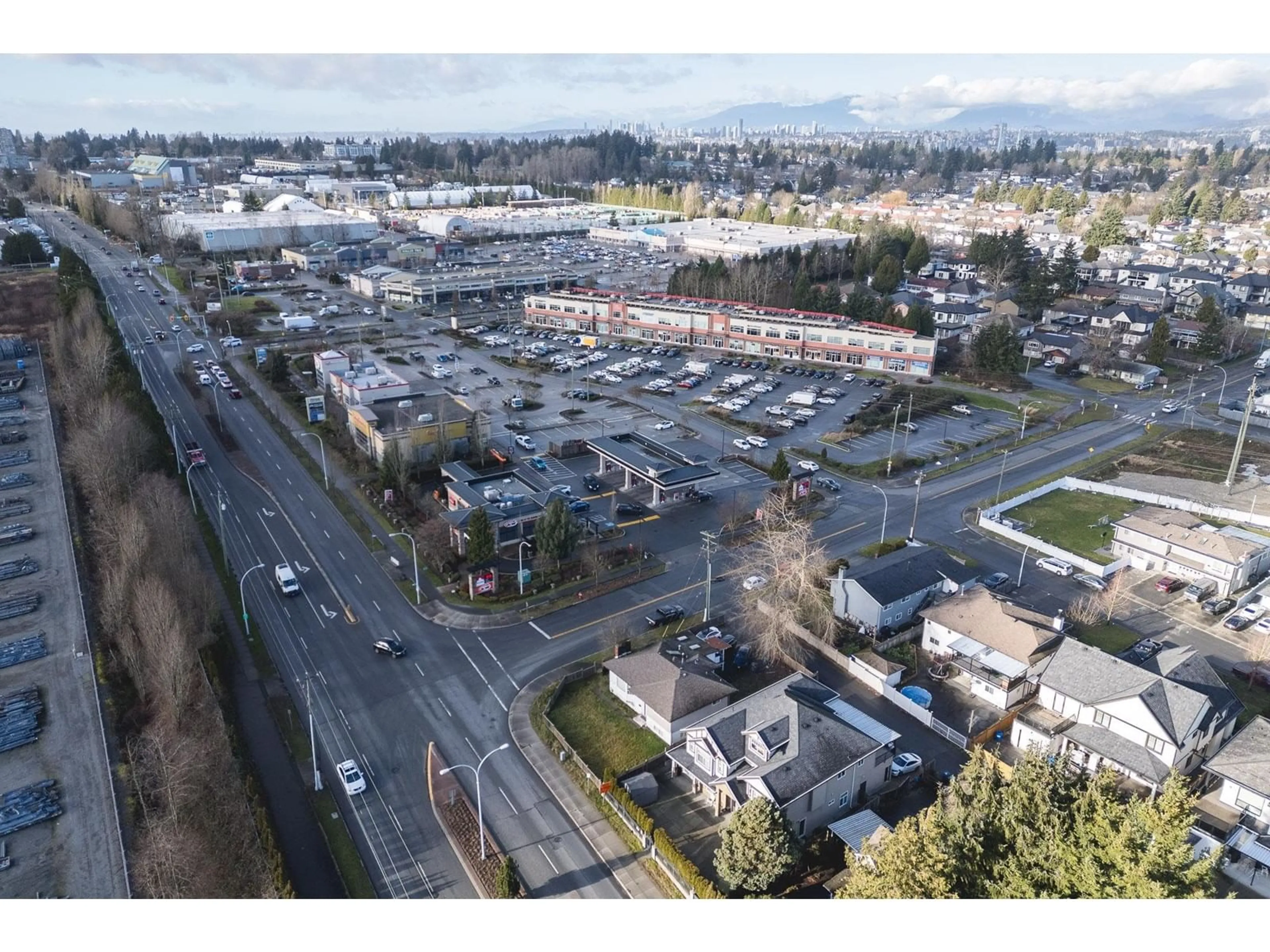 A pic from outside/outdoor area/front of a property/back of a property/a pic from drone, mountain view for 12617 88, Surrey British Columbia V3W3J8