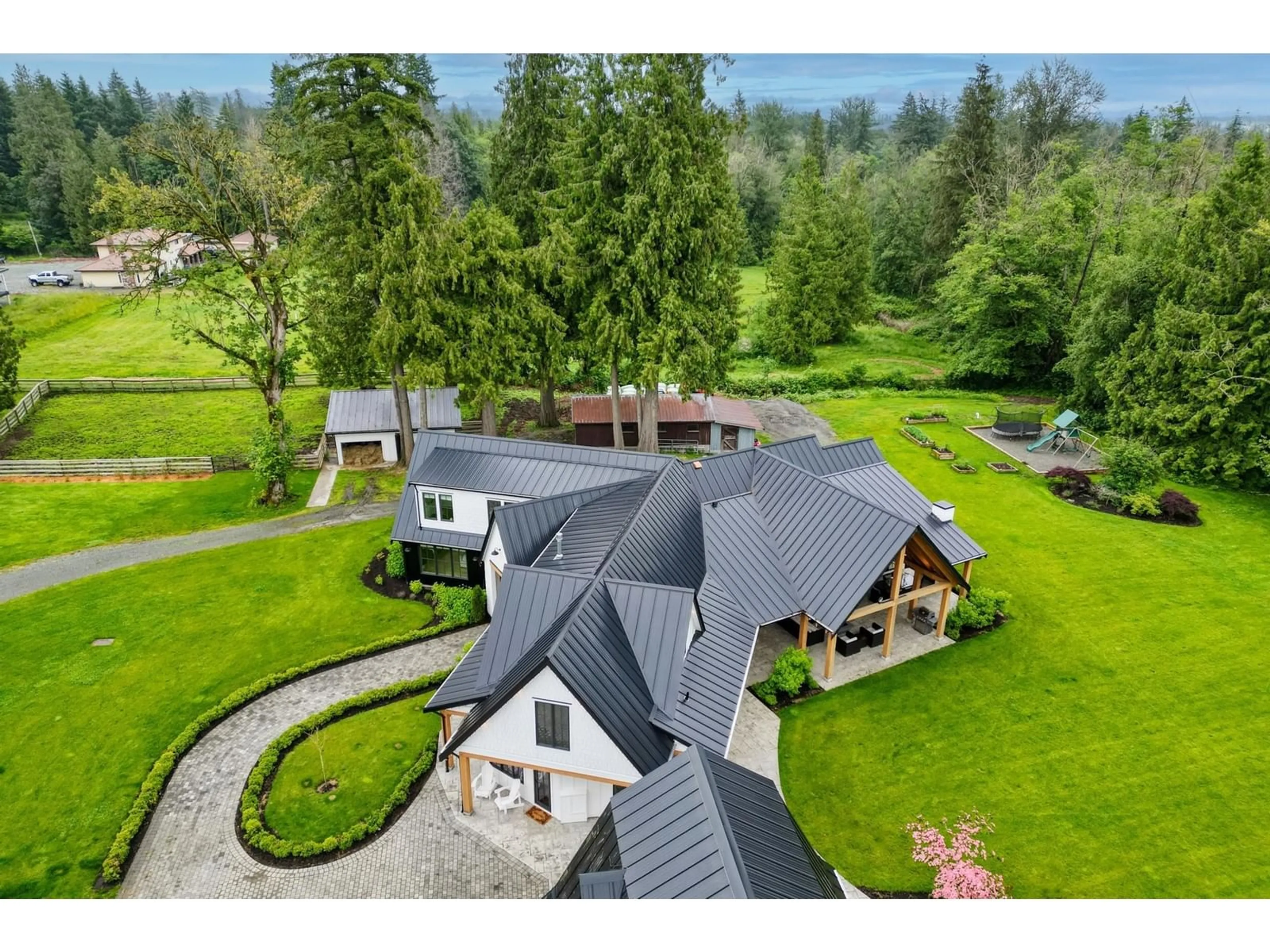 A pic from outside/outdoor area/front of a property/back of a property/a pic from drone, mountain view for 24968 28, Langley British Columbia V4W2R2
