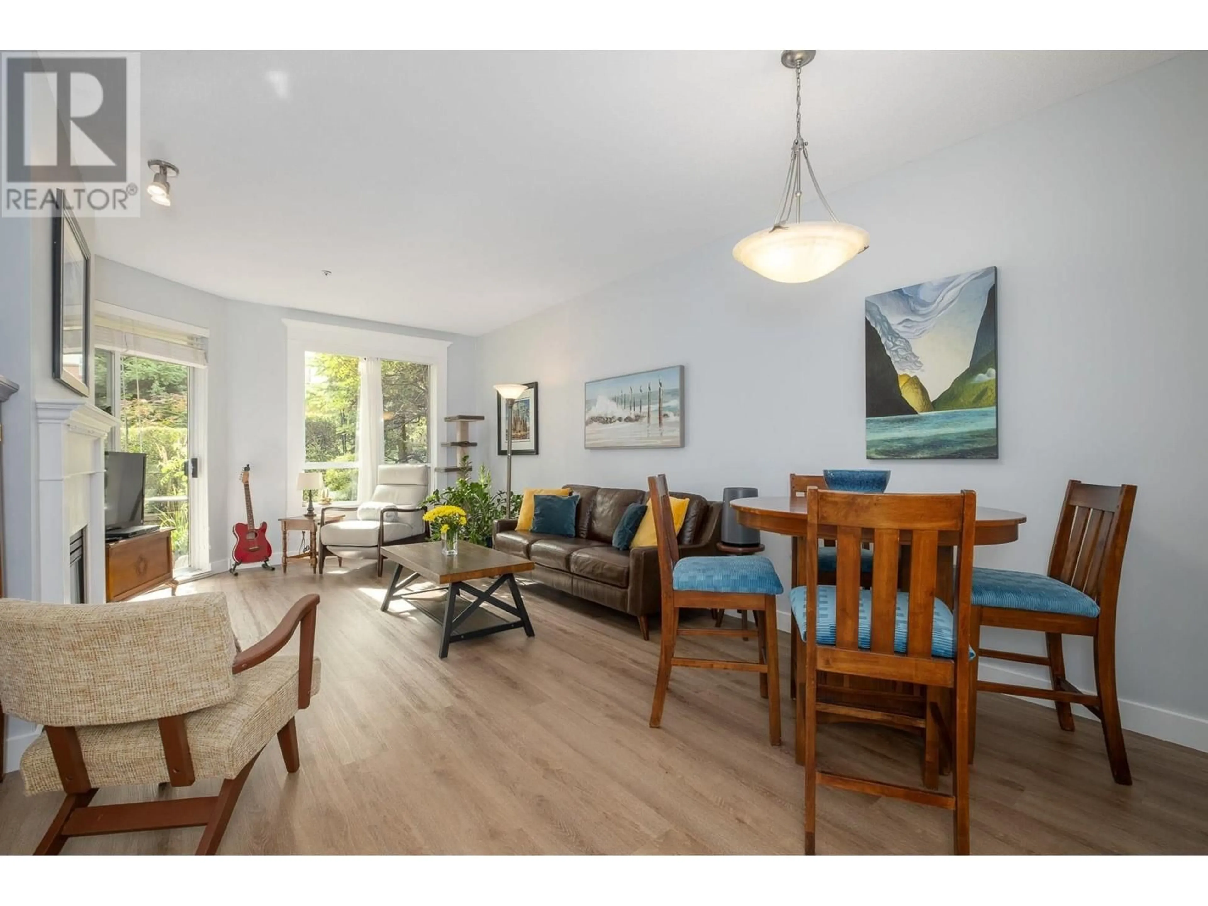 Living room with furniture, wood/laminate floor for 205 360 E 36TH AVENUE, Vancouver British Columbia V5W4B9