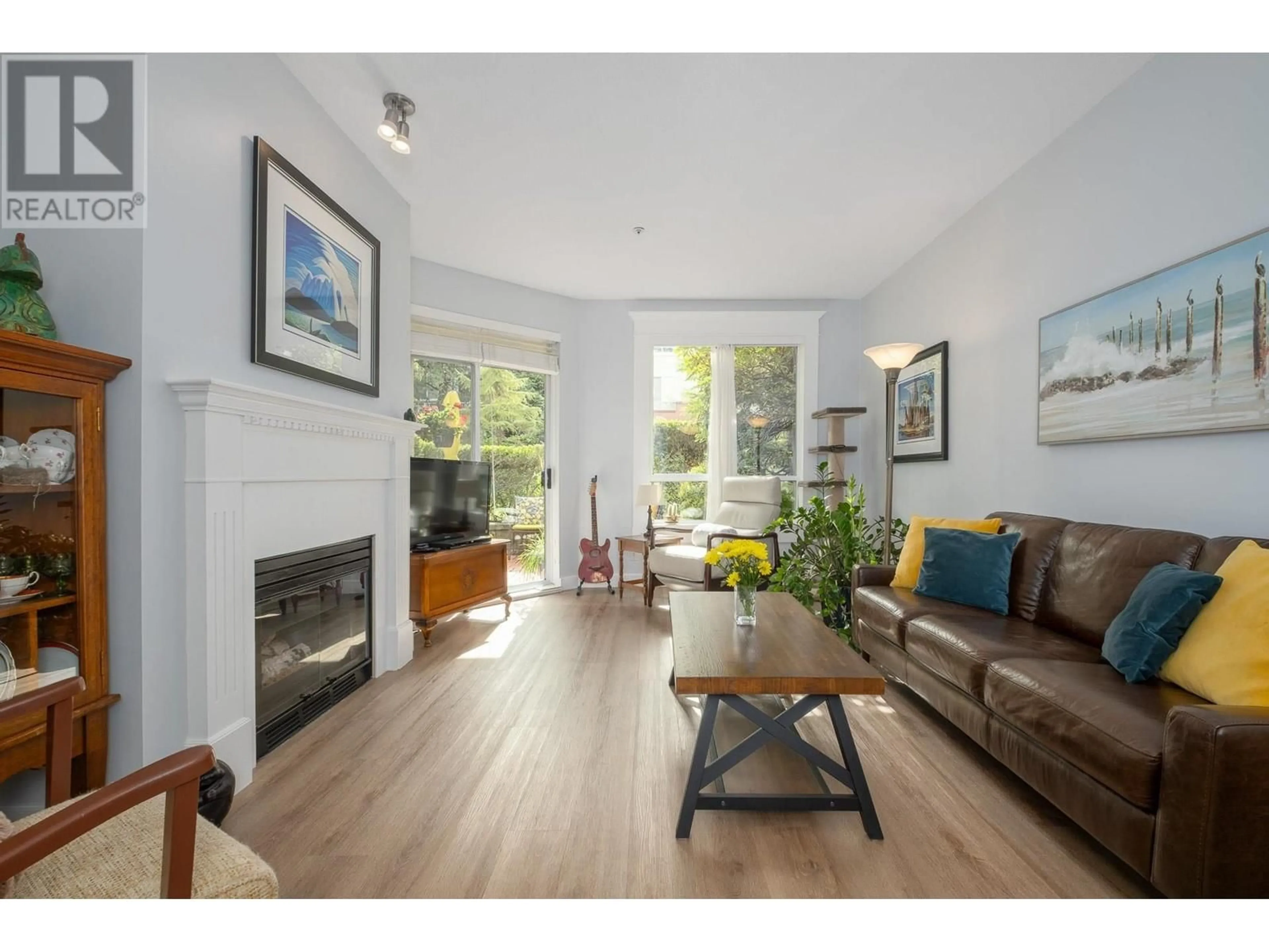 Living room with furniture, wood/laminate floor for 205 360 E 36TH AVENUE, Vancouver British Columbia V5W4B9