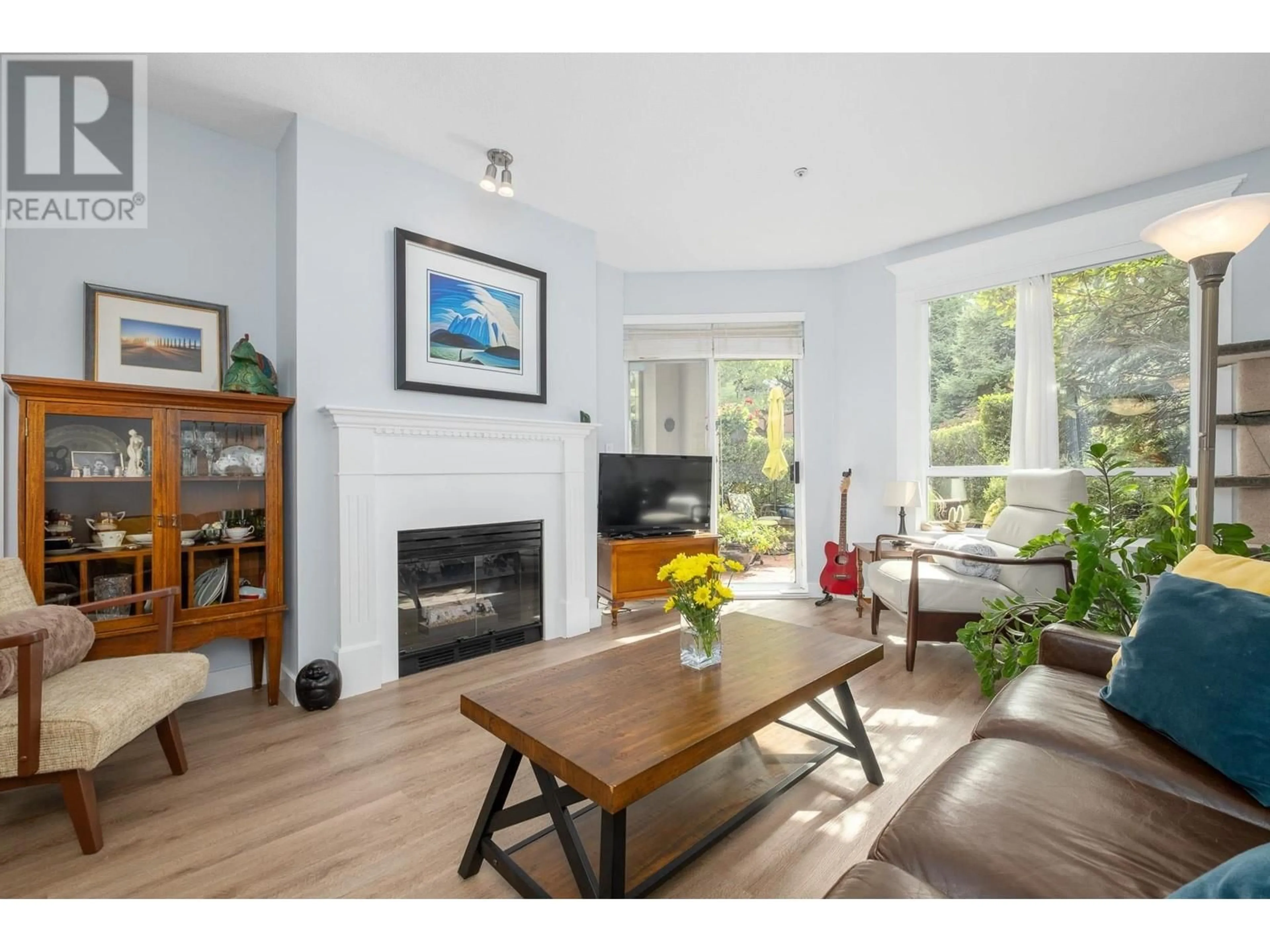 Living room with furniture, wood/laminate floor for 205 360 E 36TH AVENUE, Vancouver British Columbia V5W4B9