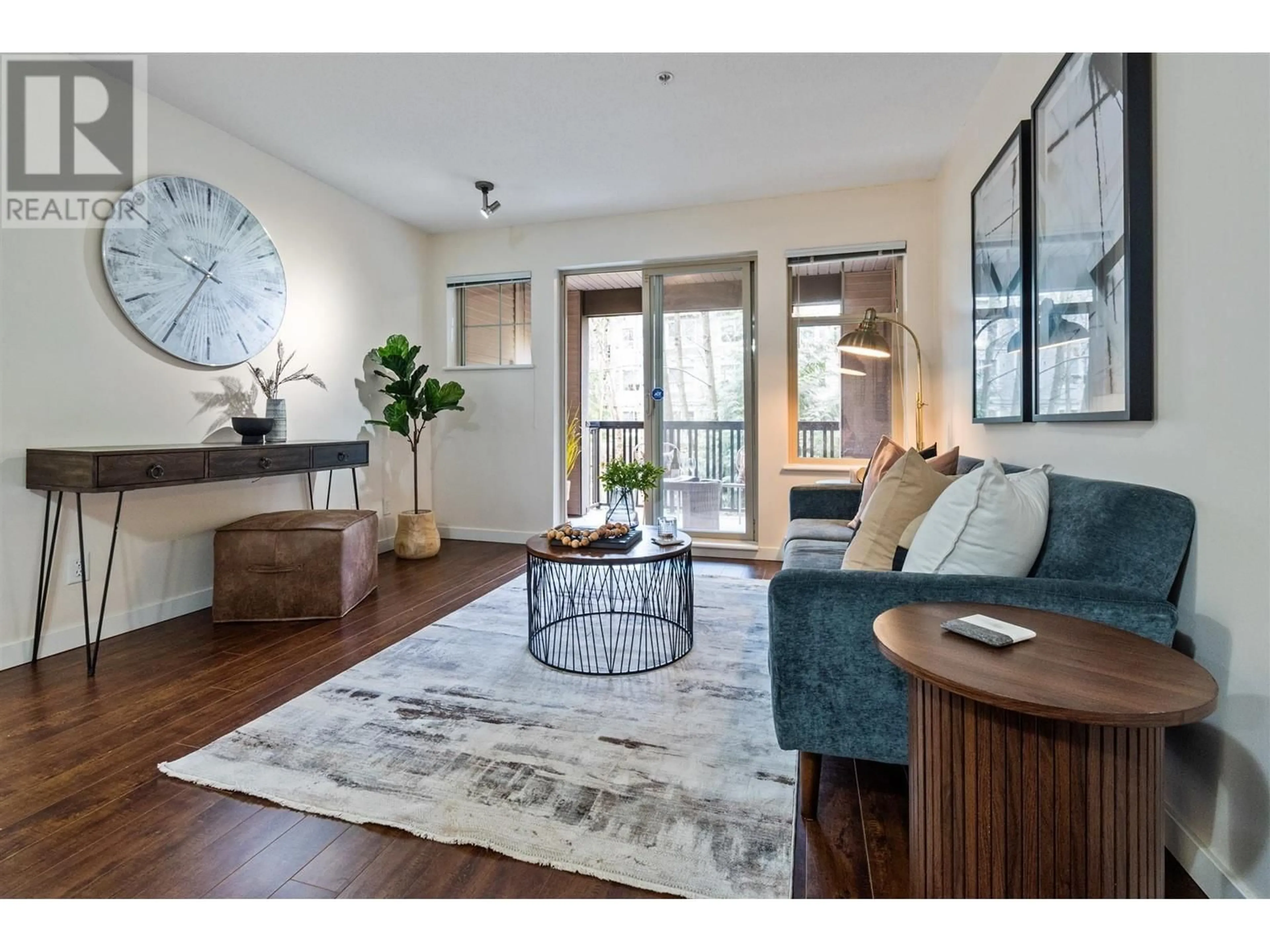 Living room with furniture, wood/laminate floor for 206 2988 SILVER SPRINGS BOULEVARD, Coquitlam British Columbia V3E3R6