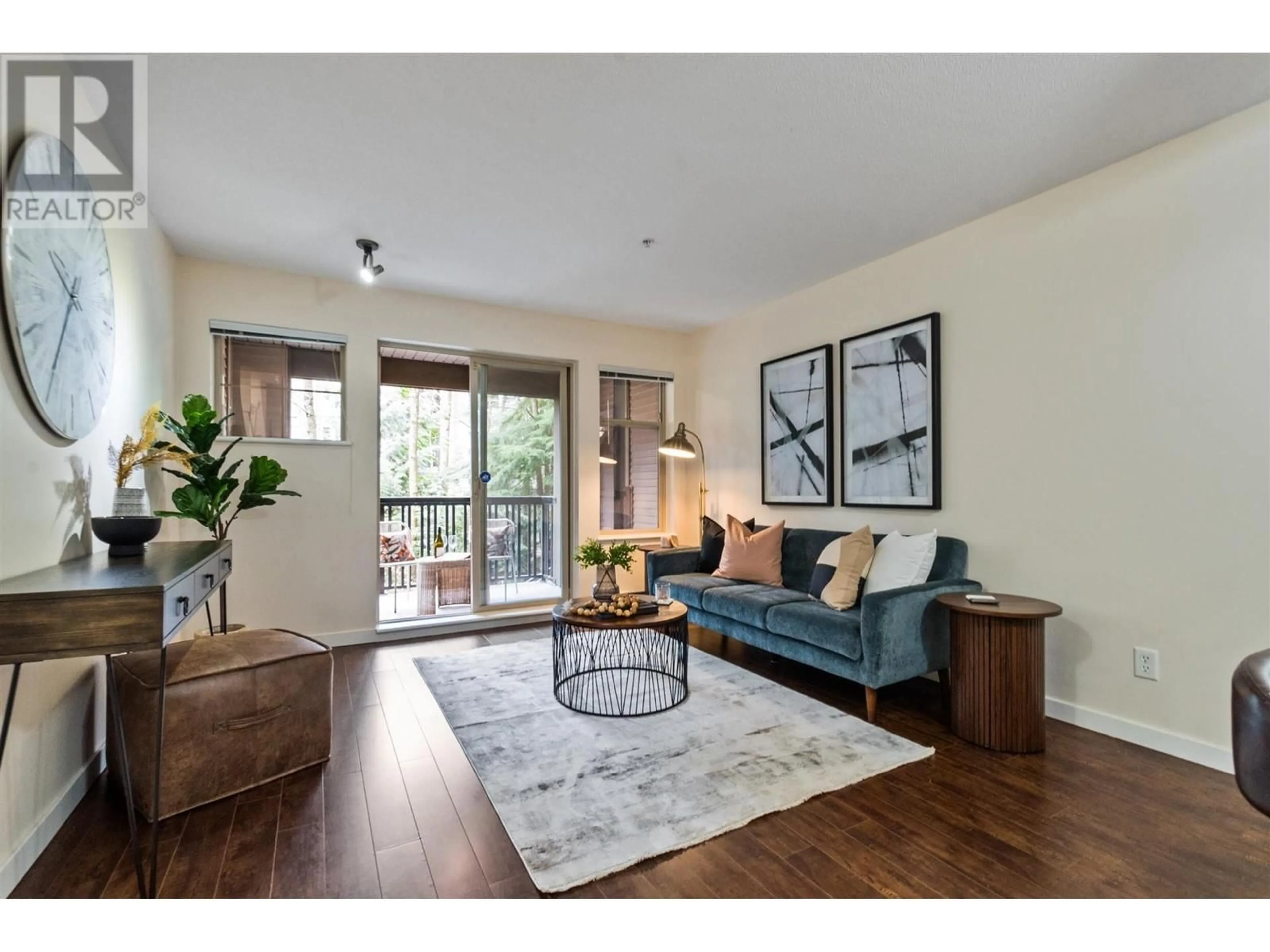 Living room with furniture, wood/laminate floor for 206 2988 SILVER SPRINGS BOULEVARD, Coquitlam British Columbia V3E3R6