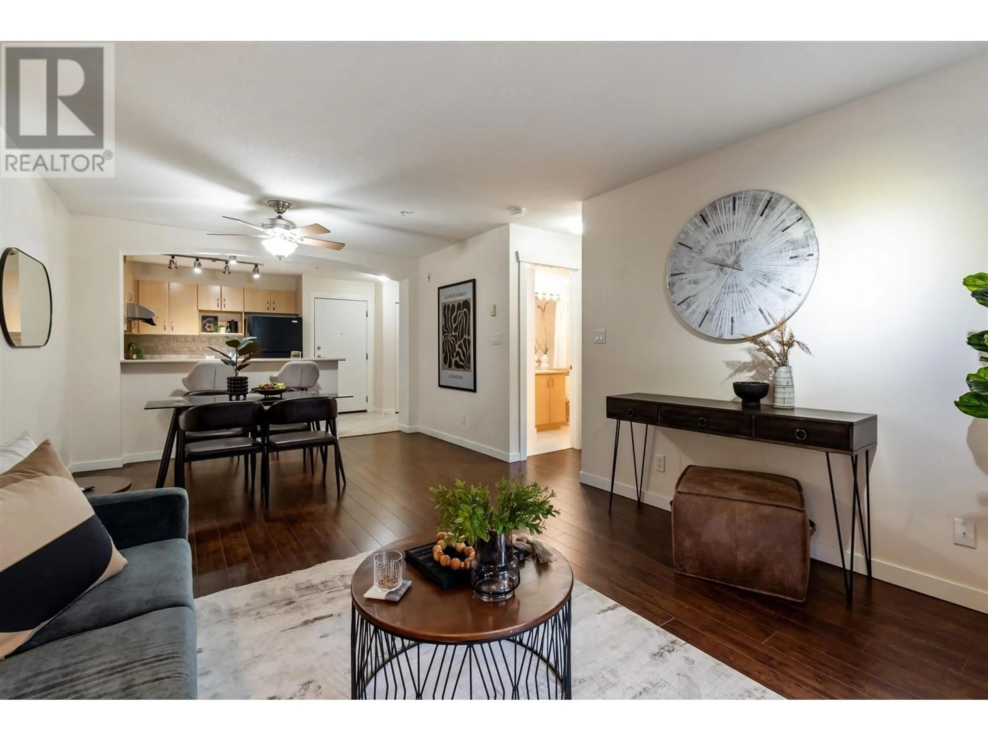 Living room with furniture, wood/laminate floor for 206 2988 SILVER SPRINGS BOULEVARD, Coquitlam British Columbia V3E3R6