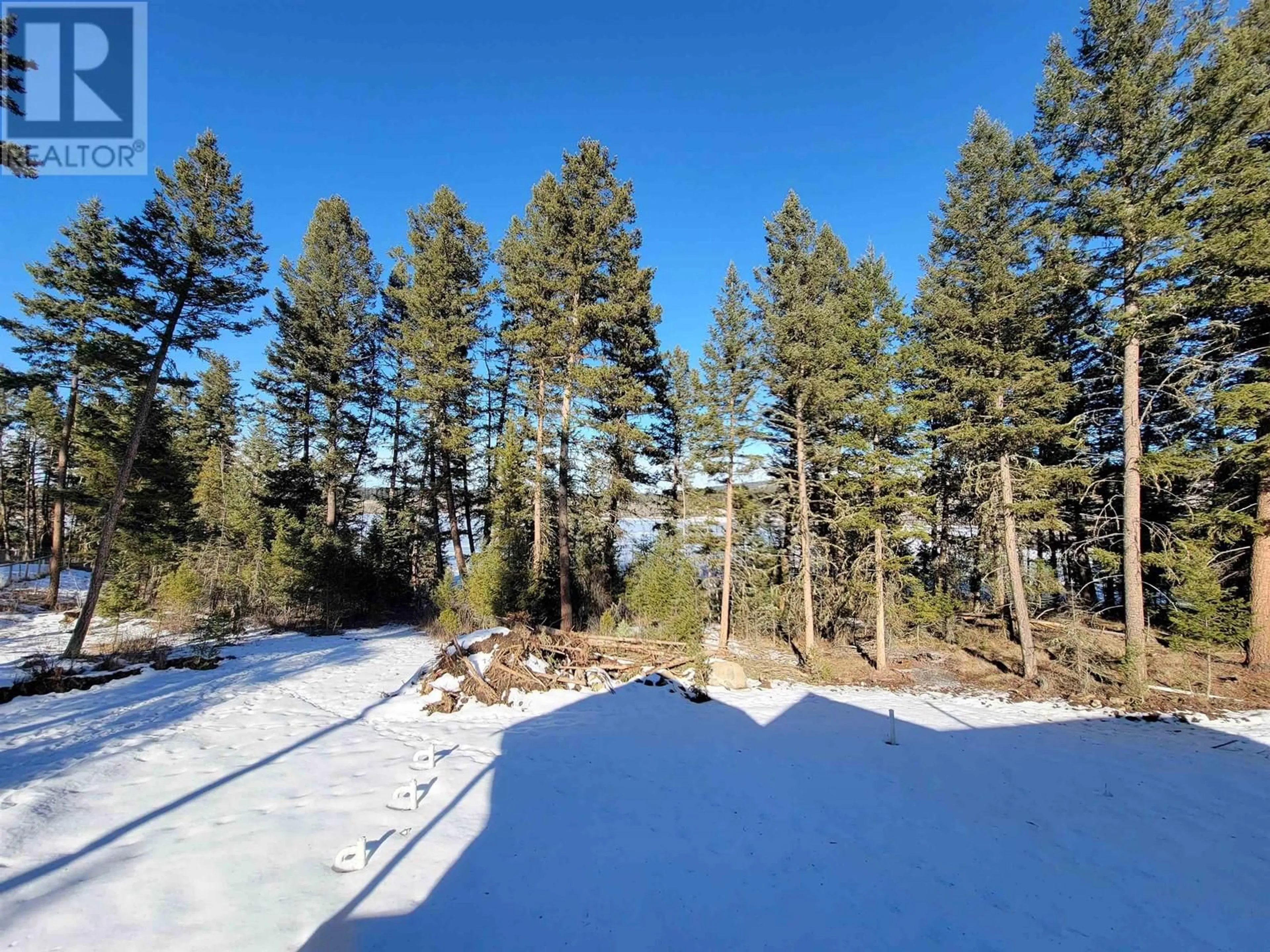 A pic from outside/outdoor area/front of a property/back of a property/a pic from drone, forest/trees view for 5343 ANNAHAM CRESCENT, 108 Mile Ranch British Columbia V0K2Z0