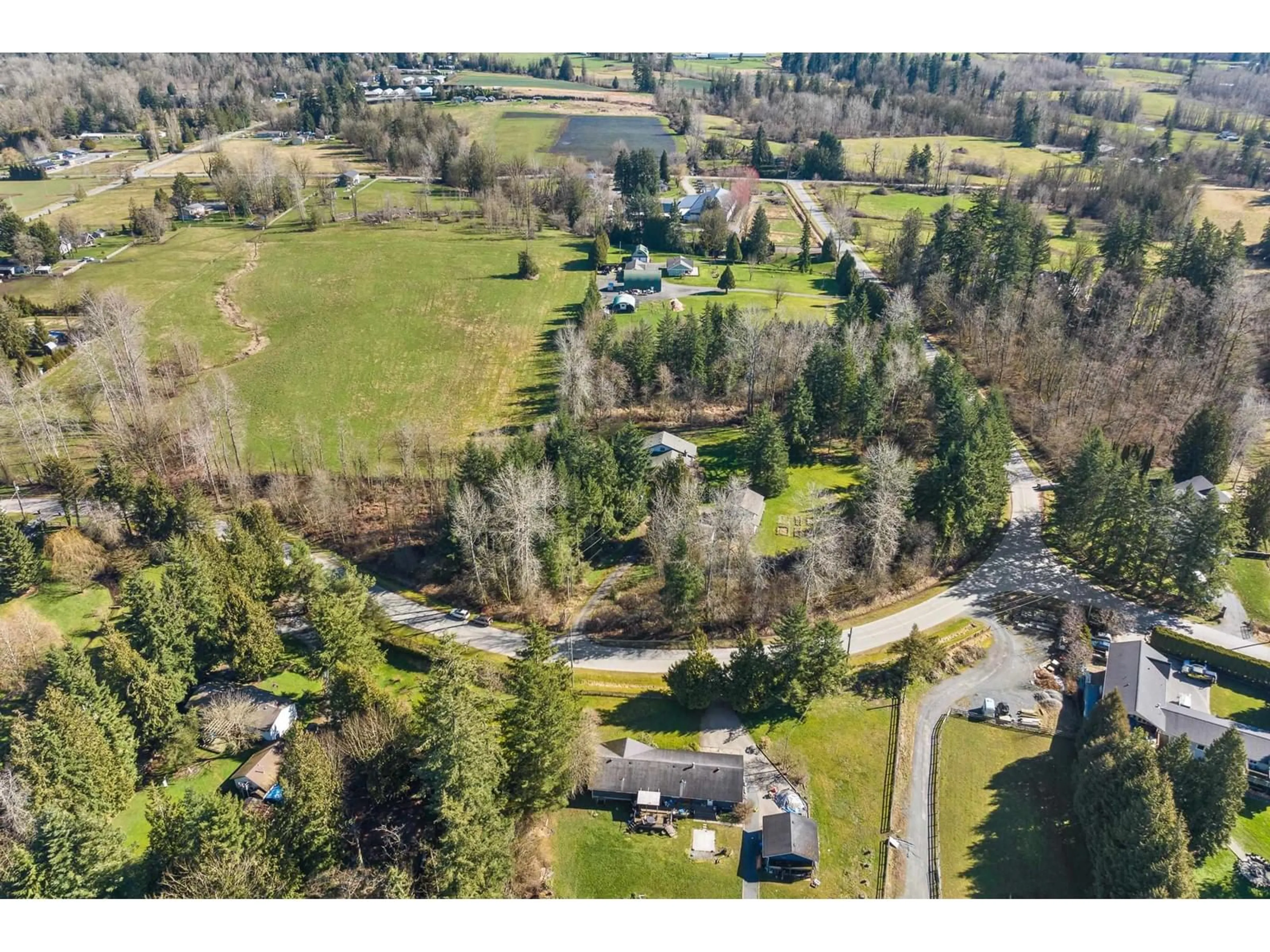 A pic from outside/outdoor area/front of a property/back of a property/a pic from drone, unknown for 7024 HESSLEA CRESCENT, Abbotsford British Columbia V3A2V3