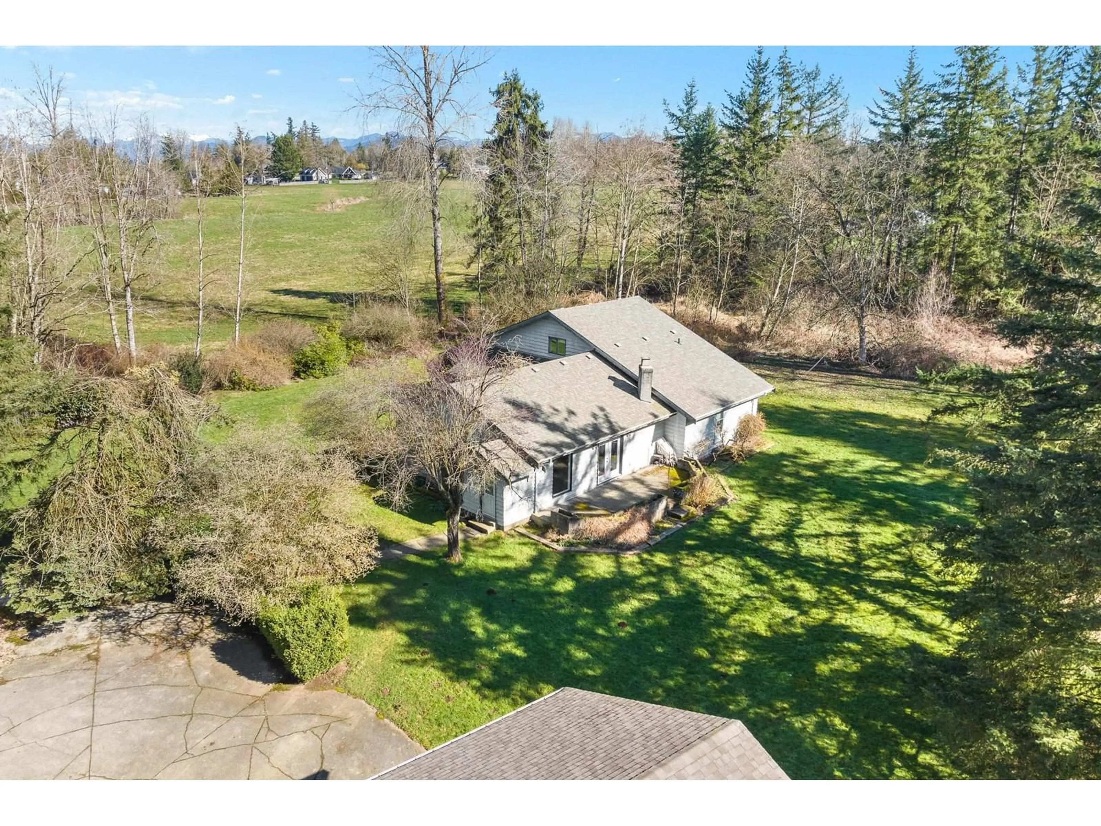 A pic from outside/outdoor area/front of a property/back of a property/a pic from drone, unknown for 7024 HESSLEA CRESCENT, Abbotsford British Columbia V3A2V3