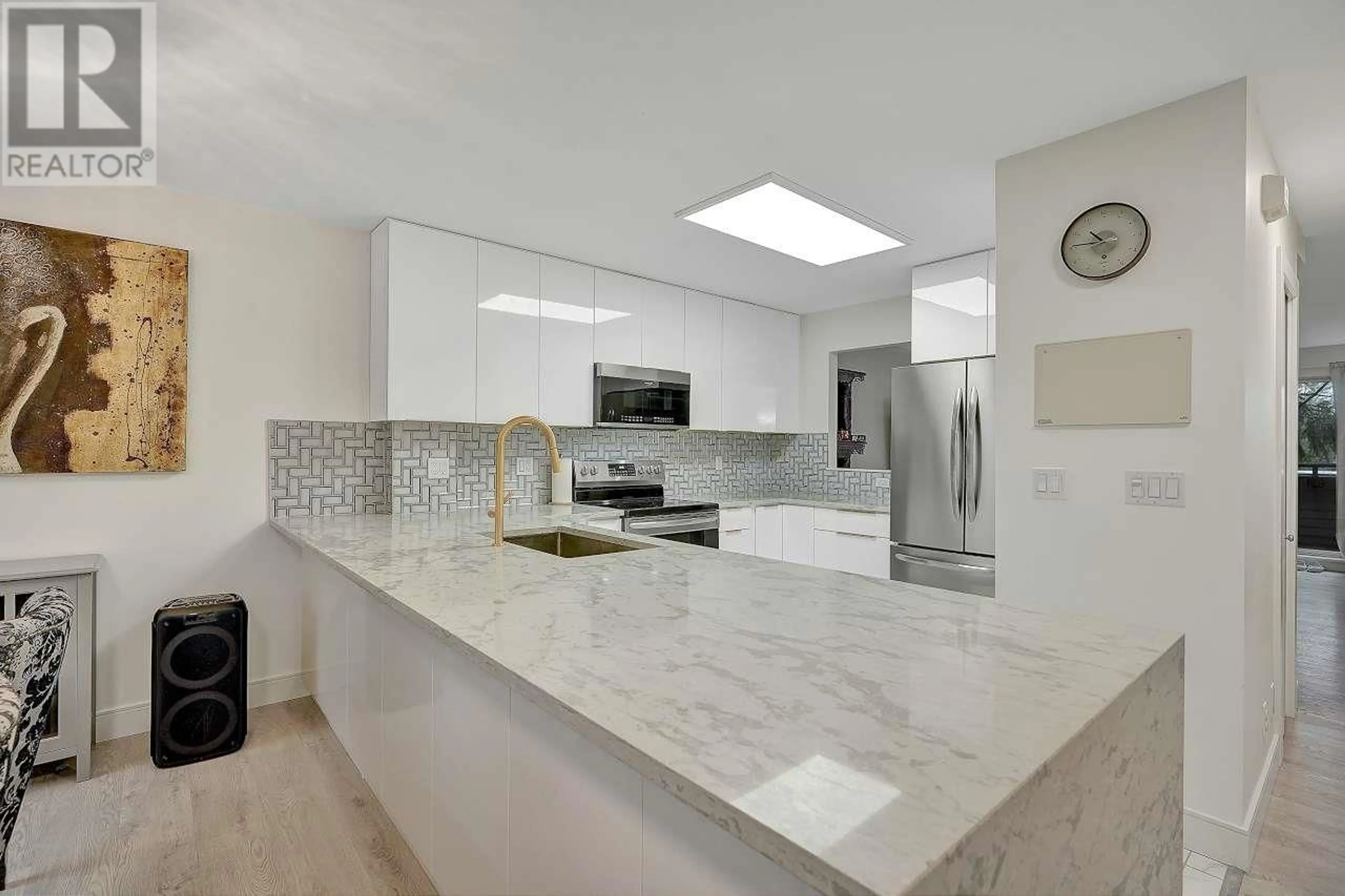 Contemporary kitchen, ceramic/tile floor for 144 SHORELINE CIRCLE, Port Moody British Columbia V3H5B3