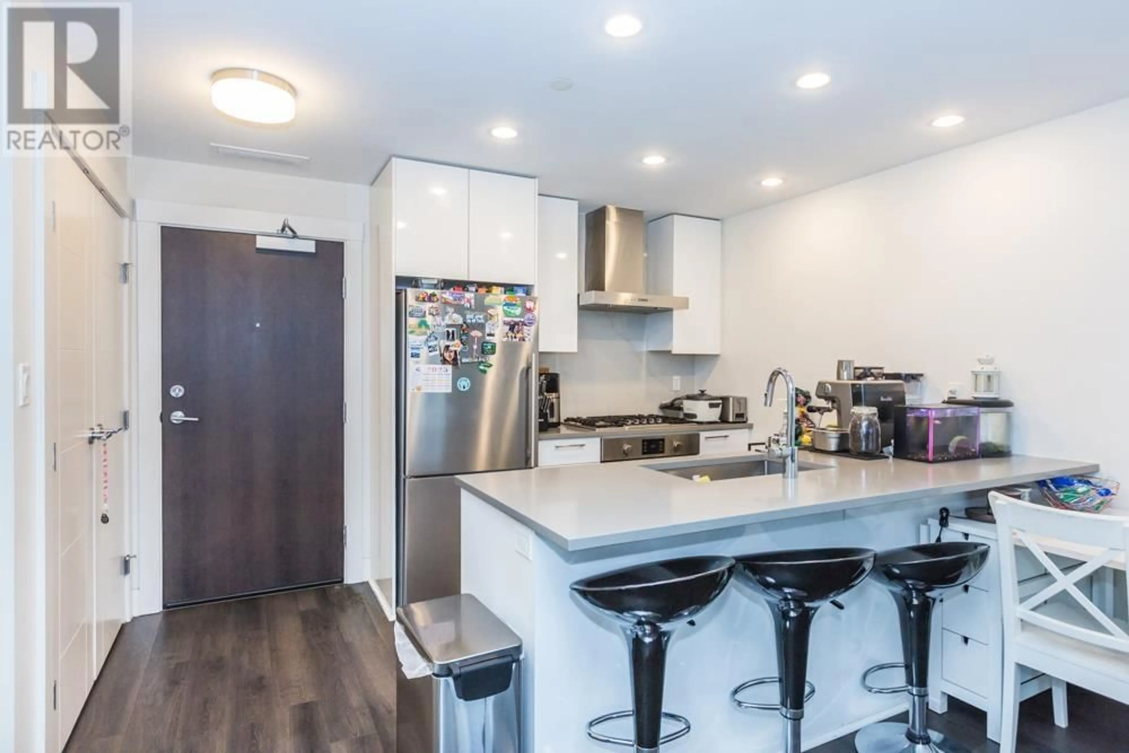 Open concept kitchen, unknown for 218 10780 NO. 5 ROAD, Richmond British Columbia V6W0B8