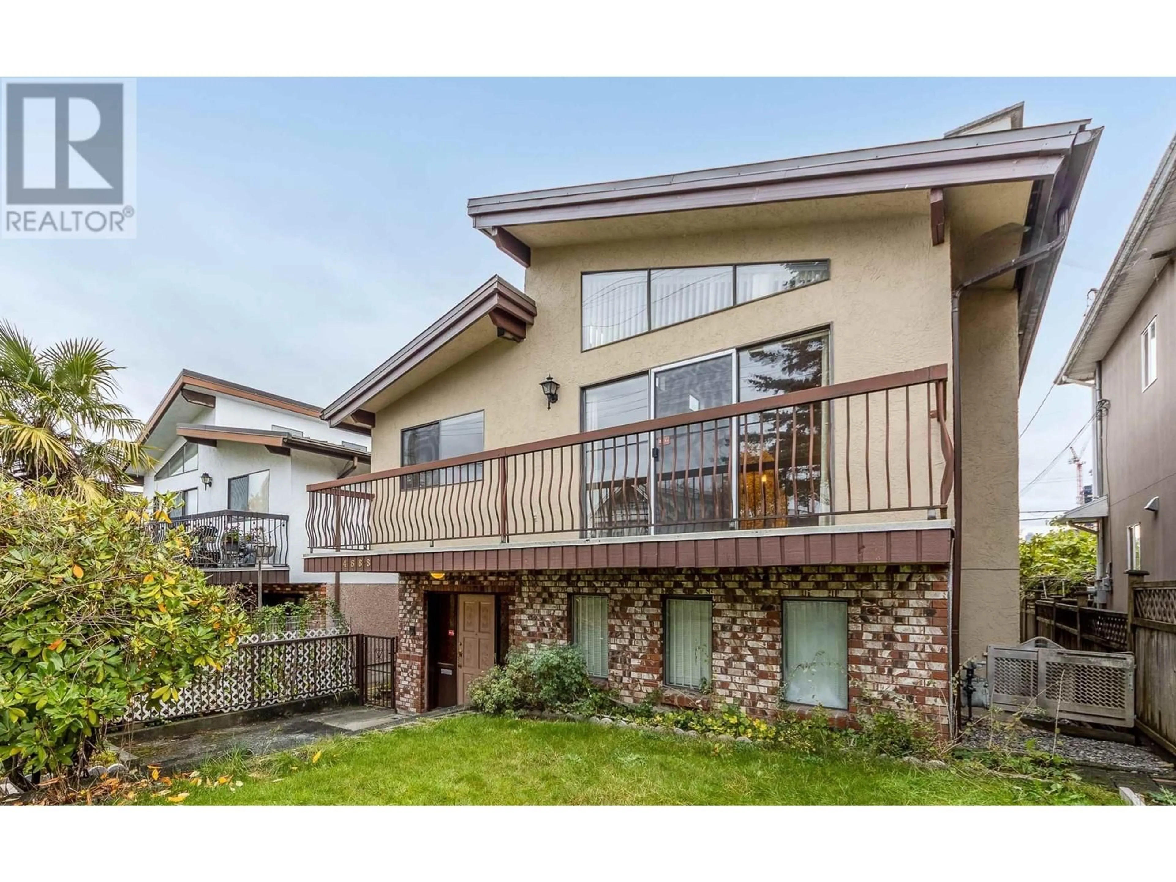 Home with vinyl exterior material, mountain view for 4688 MANOR STREET, Vancouver British Columbia V5R3X6