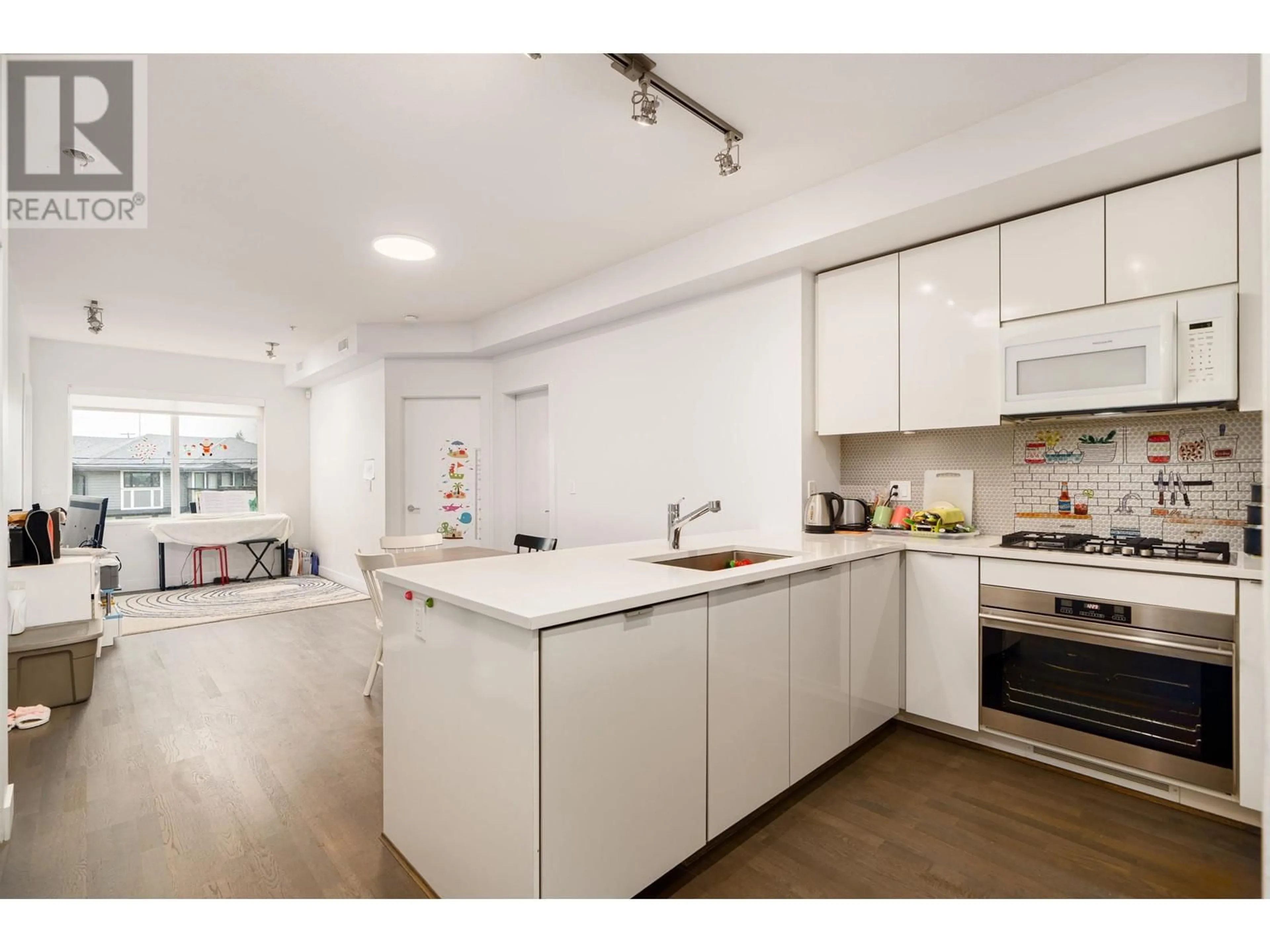 Open concept kitchen, unknown for 105 - 10011 RIVER DRIVE, Richmond British Columbia V6X0N2