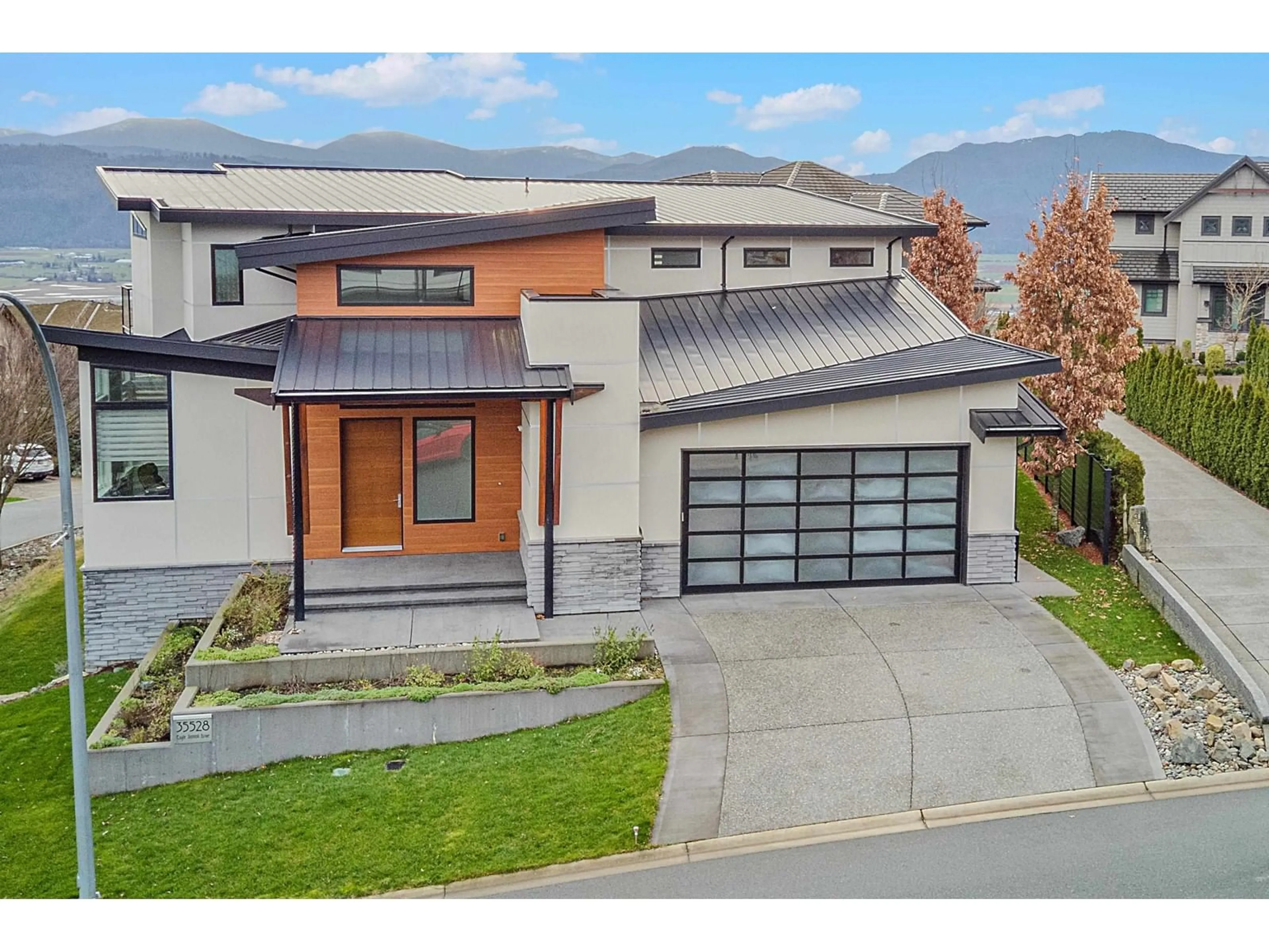 Home with brick exterior material, street for 35528 EAGLE SUMMIT DRIVE, Abbotsford British Columbia V3G0C4