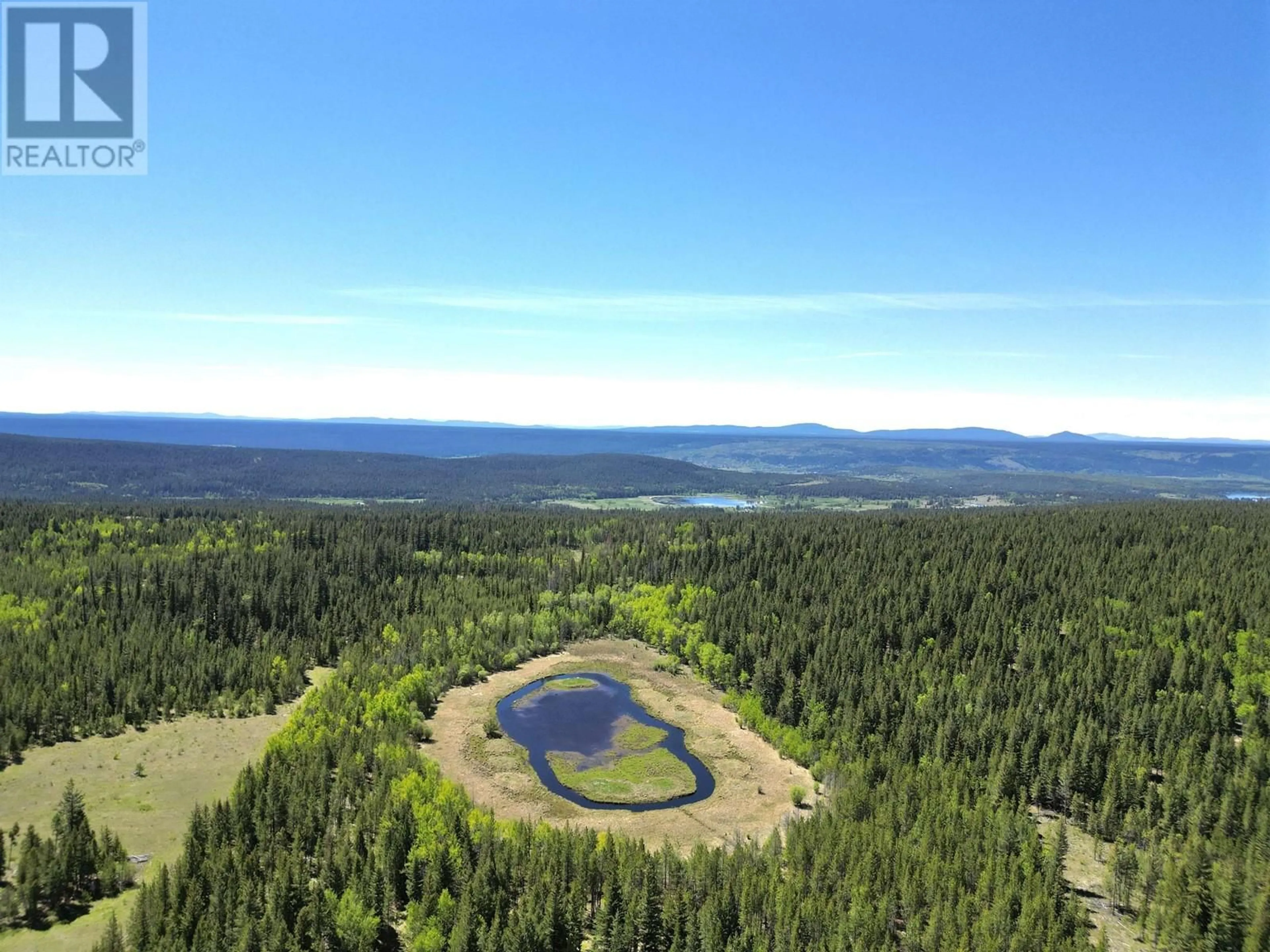 A pic from outside/outdoor area/front of a property/back of a property/a pic from drone, water/lake/river/ocean view for 3338 PIGEON ROAD, 150 Mile House British Columbia V0K2G0