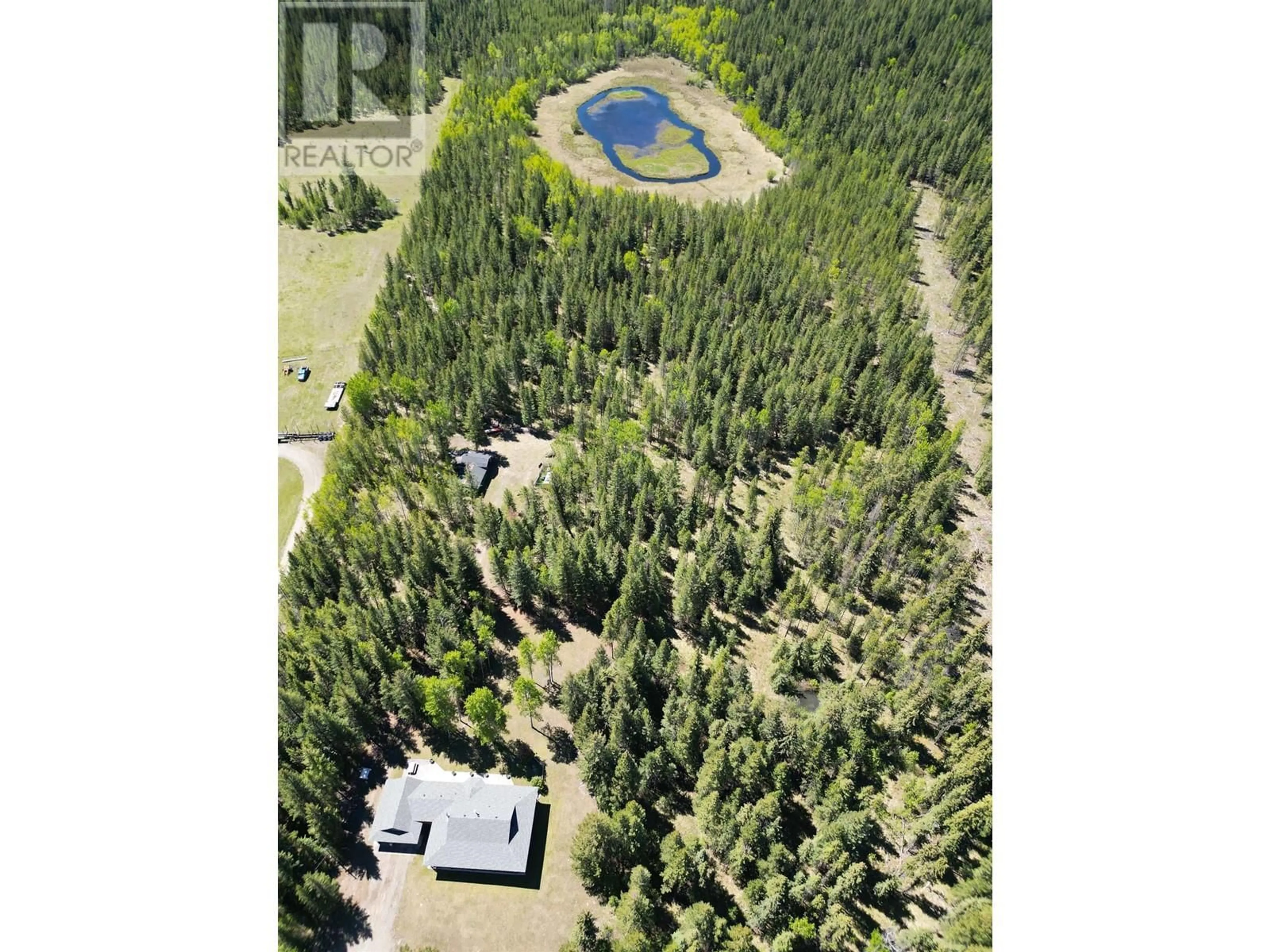 A pic from outside/outdoor area/front of a property/back of a property/a pic from drone, forest/trees view for 3338 PIGEON ROAD, 150 Mile House British Columbia V0K2G0