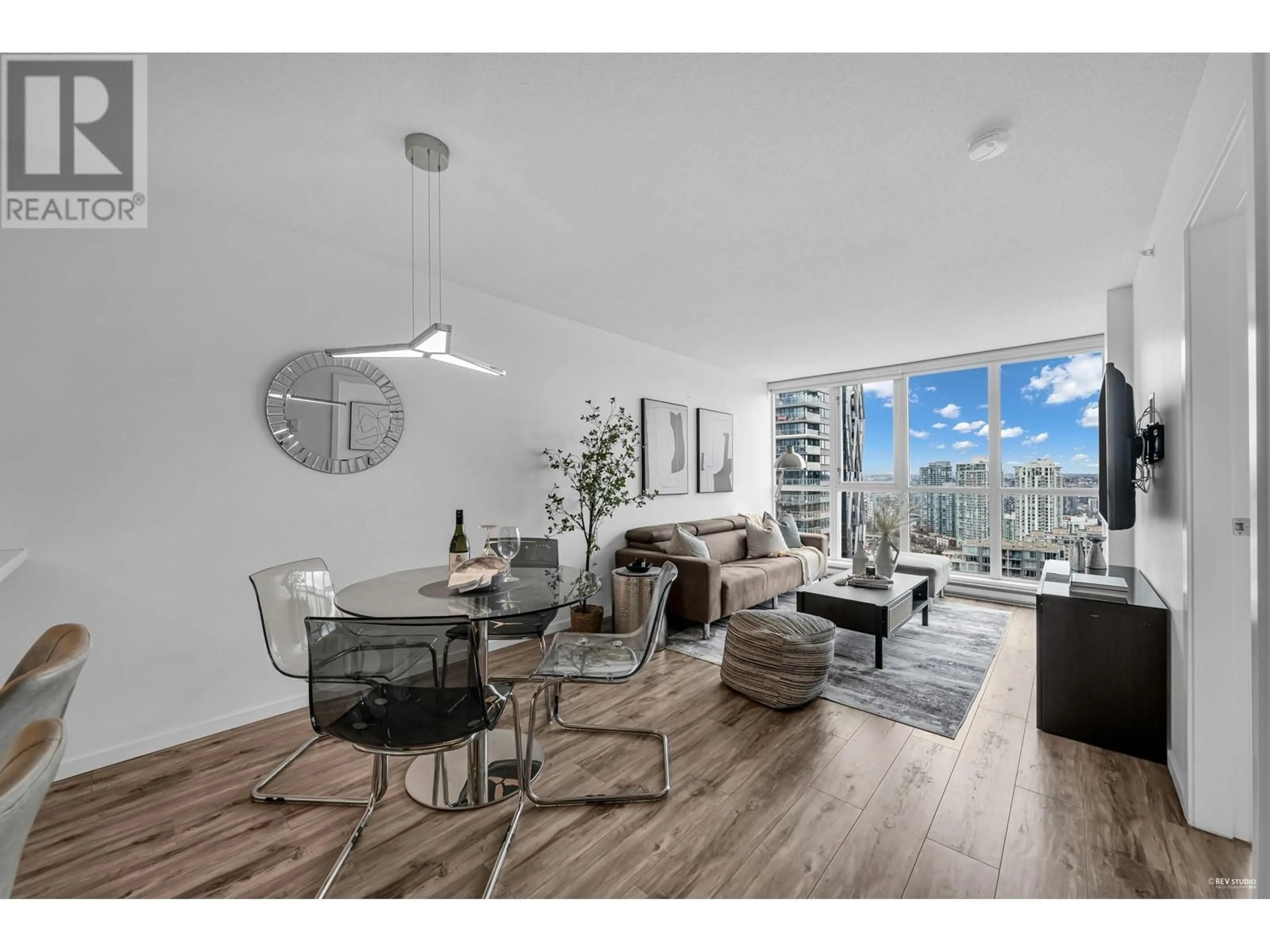 Living room with furniture, wood/laminate floor for 2305 1155 SEYMOUR STREET, Vancouver British Columbia V6B3M7