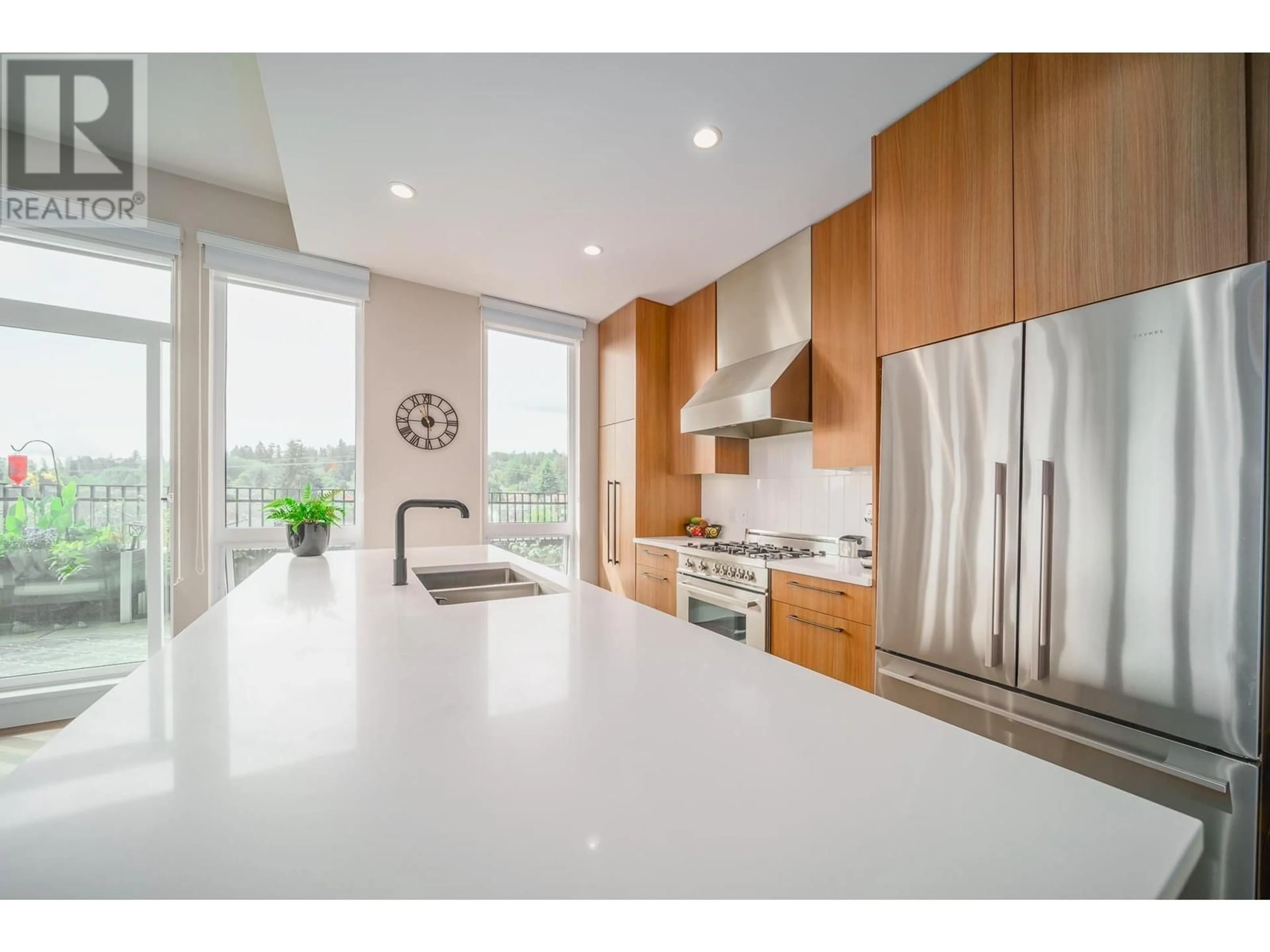 Open concept kitchen, unknown for 403 - 288 KING EDWARD AVENUE, Vancouver British Columbia V5Y2J2