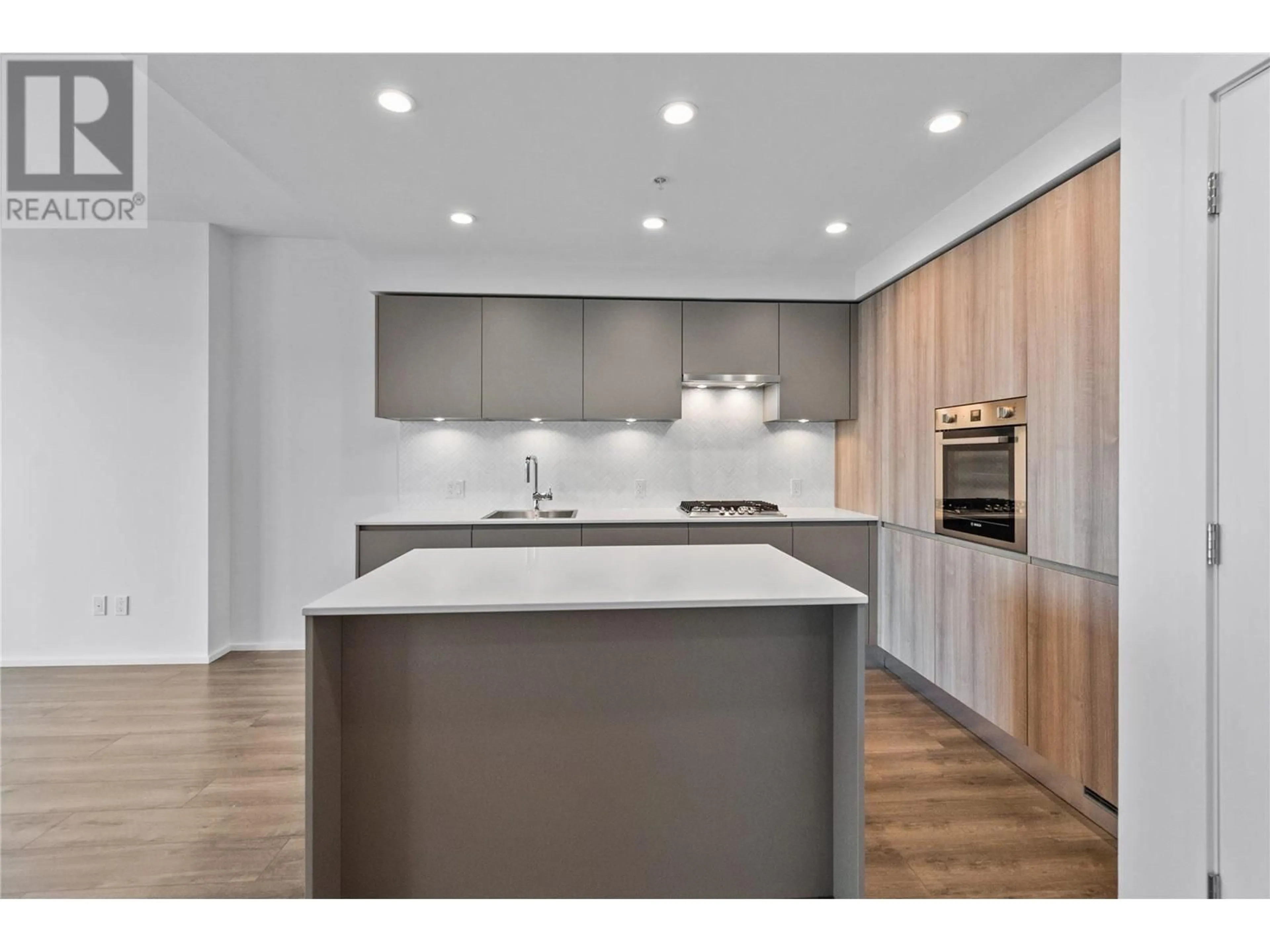 Open concept kitchen, wood/laminate floor for 4104 - 3833 EVERGREEN PLACE, Burnaby British Columbia V5C0H9