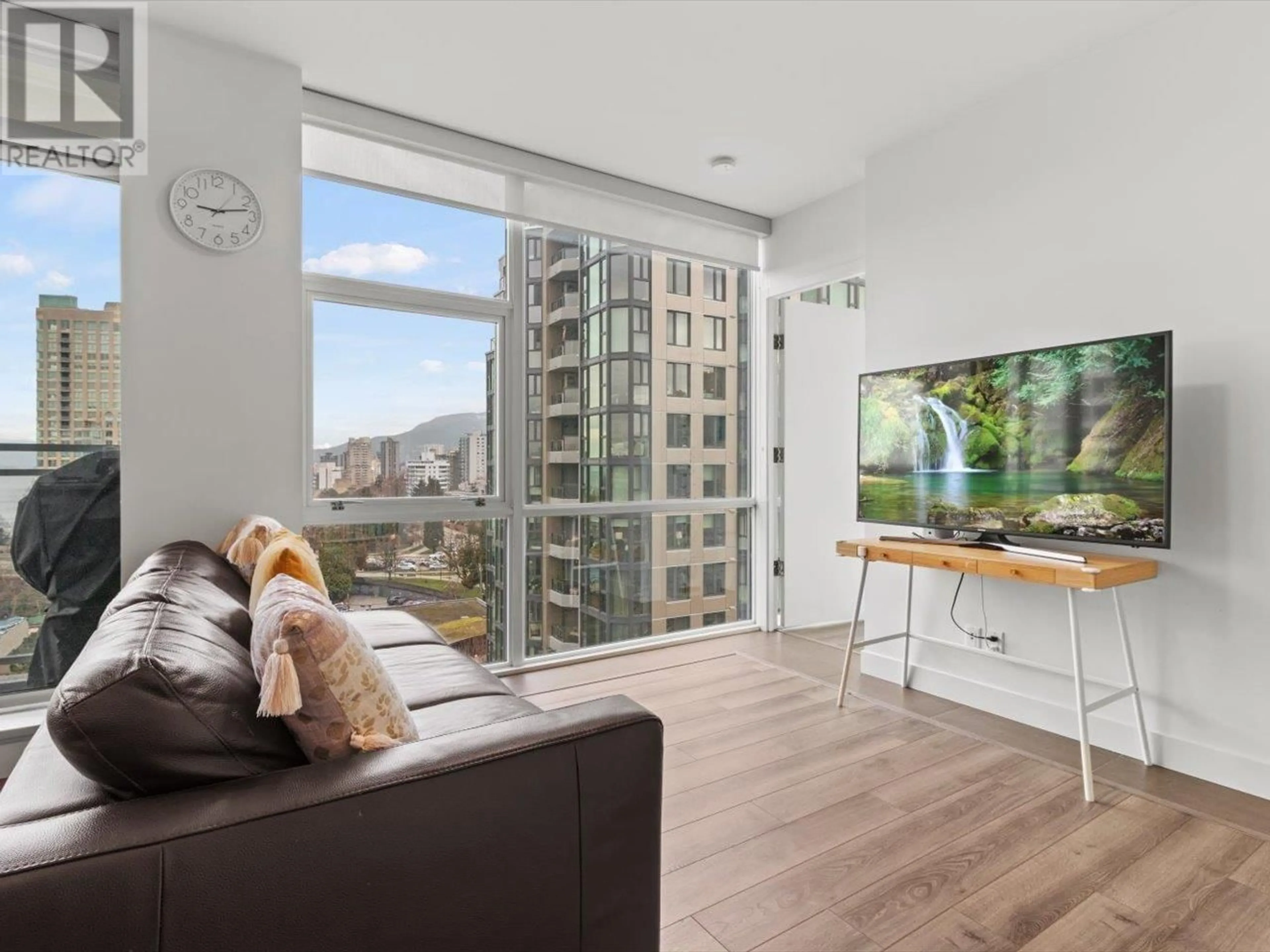 Living room with furniture, wood/laminate floor for 1201 1455 HOWE STREET, Vancouver British Columbia V6Z1C2