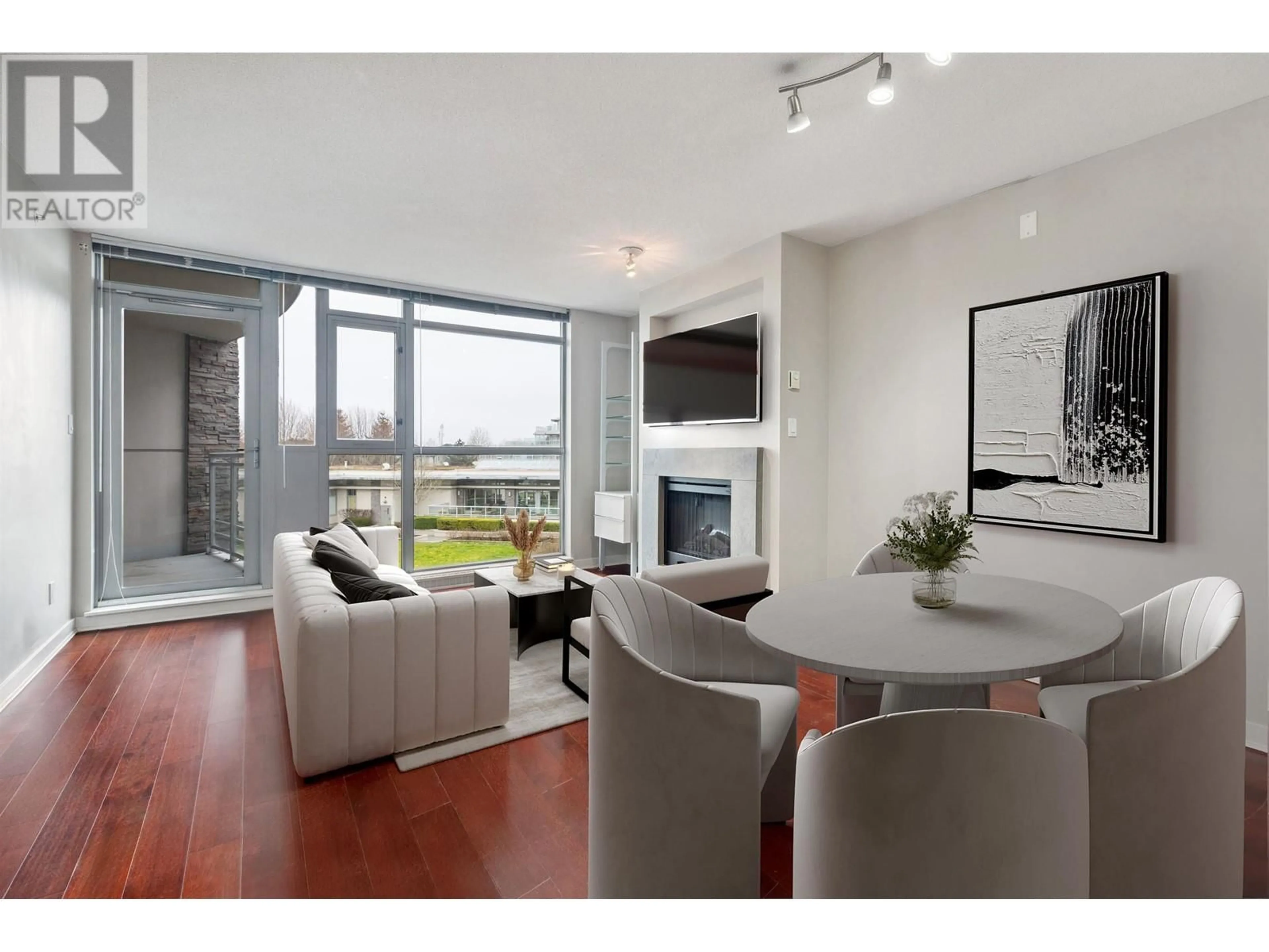 Living room with furniture, wood/laminate floor for 315 9371 HEMLOCK DRIVE, Richmond British Columbia V6Y4K6