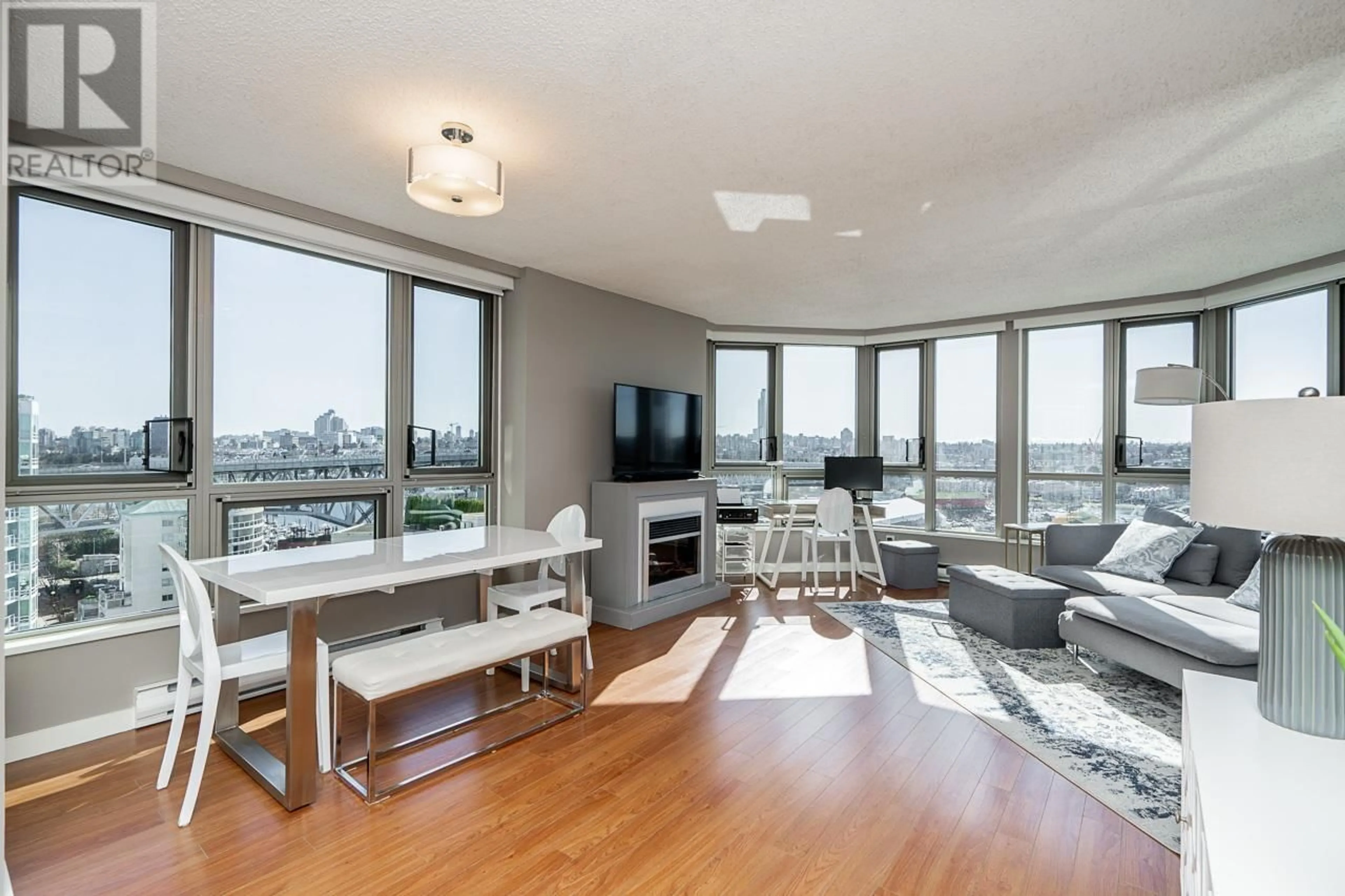 Living room with furniture, wood/laminate floor for 1402 - 1625 HORNBY STREET, Vancouver British Columbia V6Z2M2