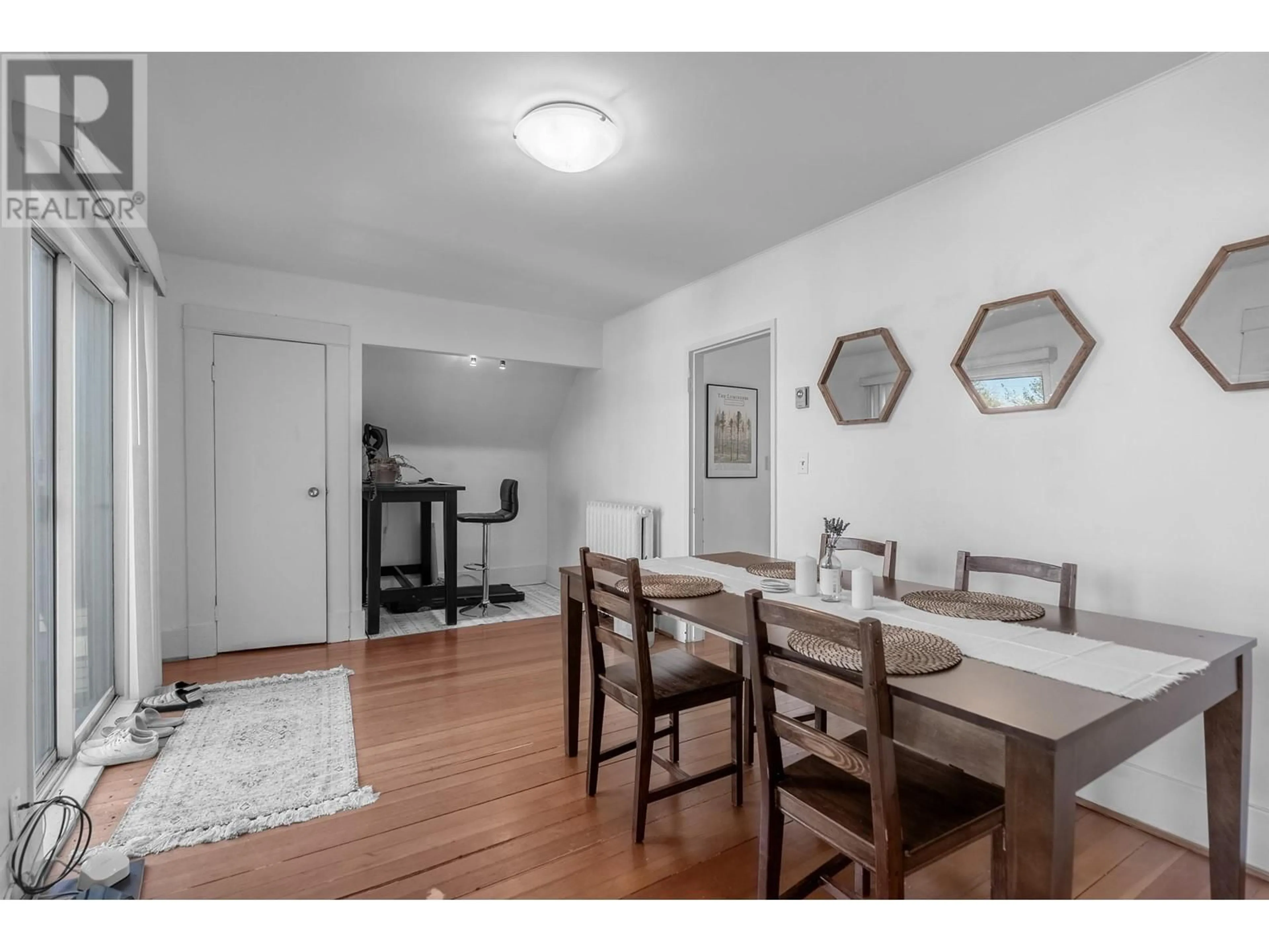 Dining room, wood/laminate floor for 3443 W 2ND AVENUE, Vancouver British Columbia V6R1J3