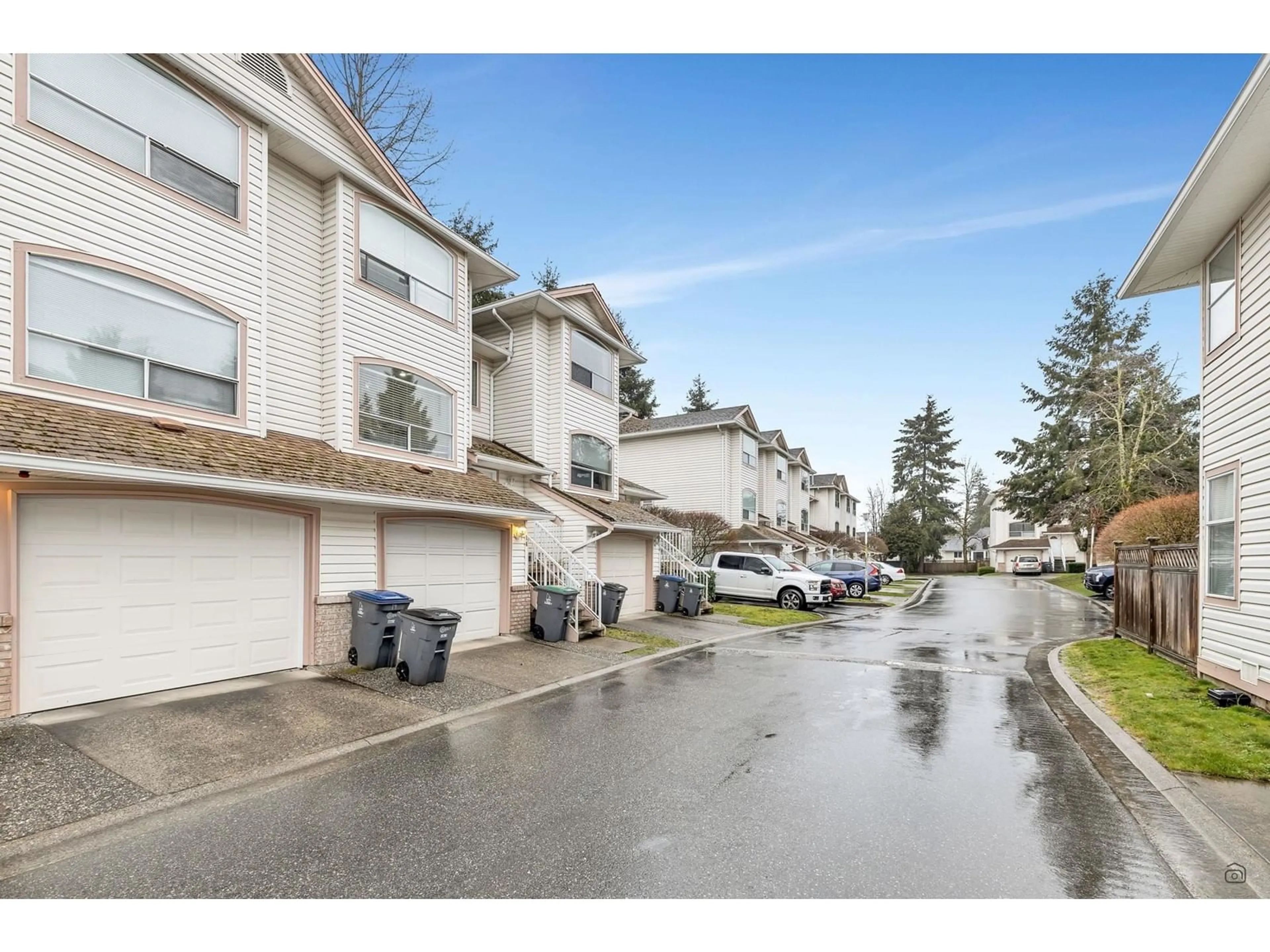A pic from outside/outdoor area/front of a property/back of a property/a pic from drone, street for 14 - 7140 132, Surrey British Columbia V3W1J5