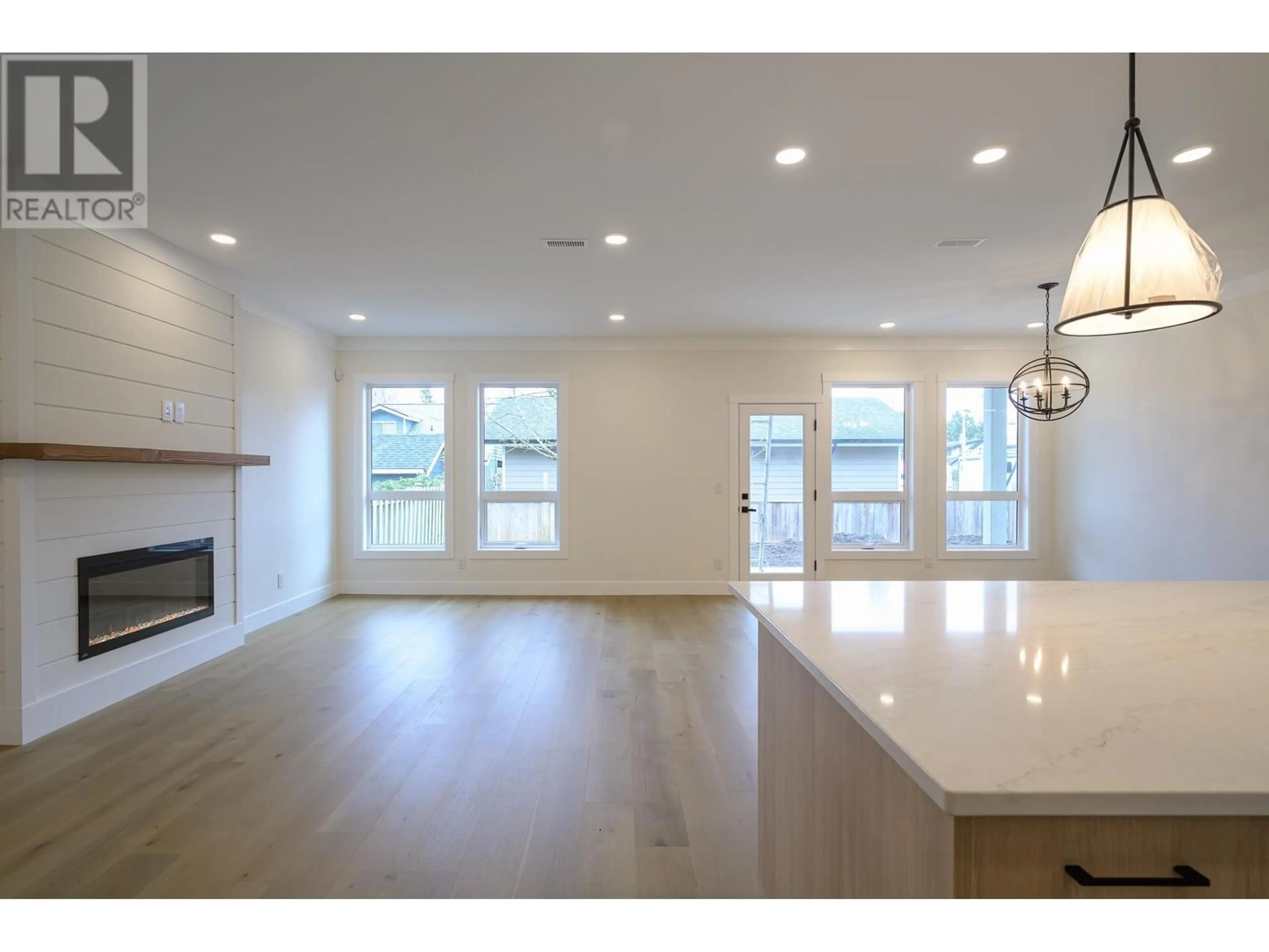 Open concept kitchen, wood/laminate floor for 4428 46B STREET, Delta British Columbia V4K2M9