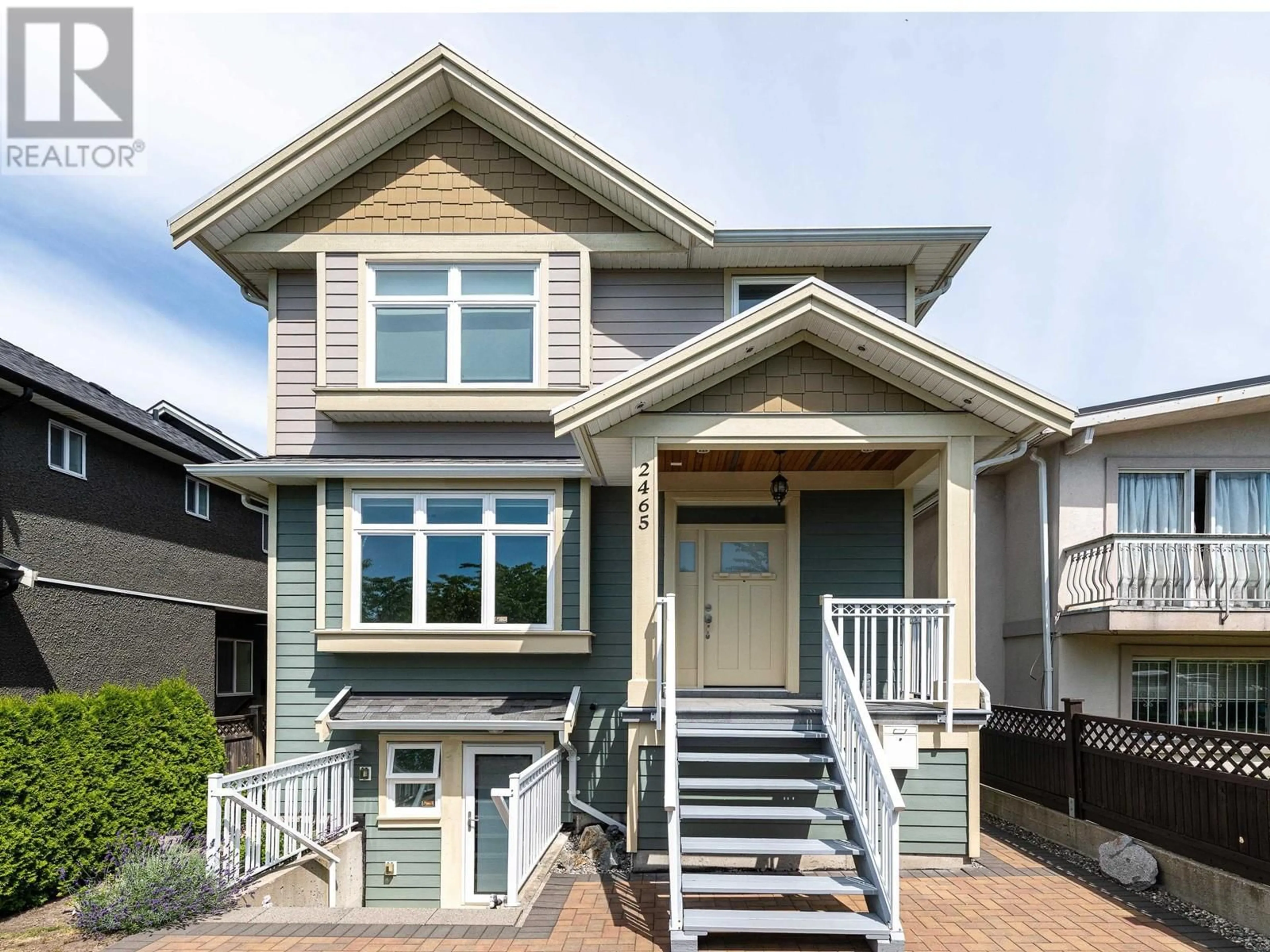 Home with vinyl exterior material, street for 2465 BROCK STREET, Vancouver British Columbia V5R2R3