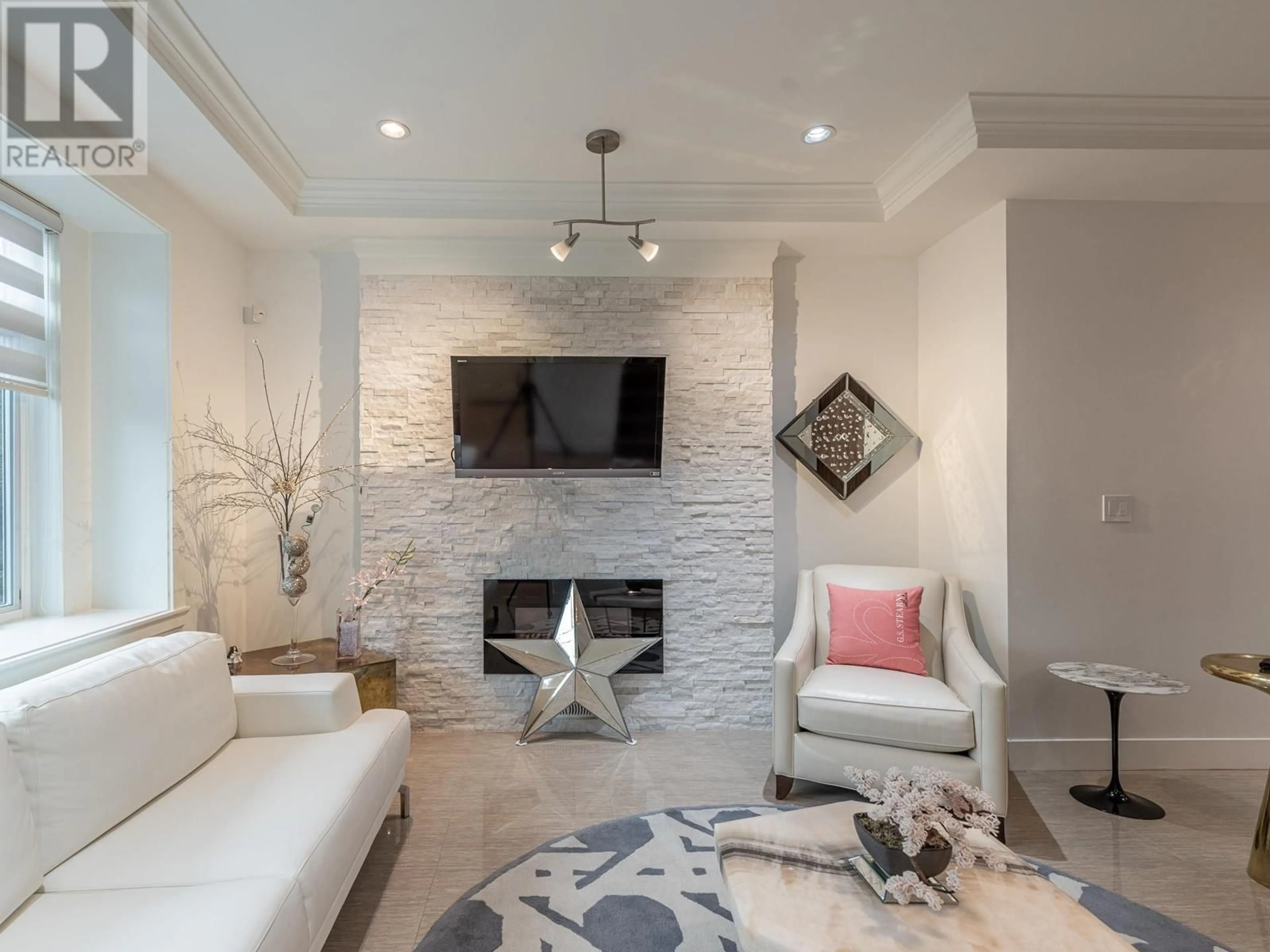 Living room with furniture, ceramic/tile floor for 2465 BROCK STREET, Vancouver British Columbia V5R2R3