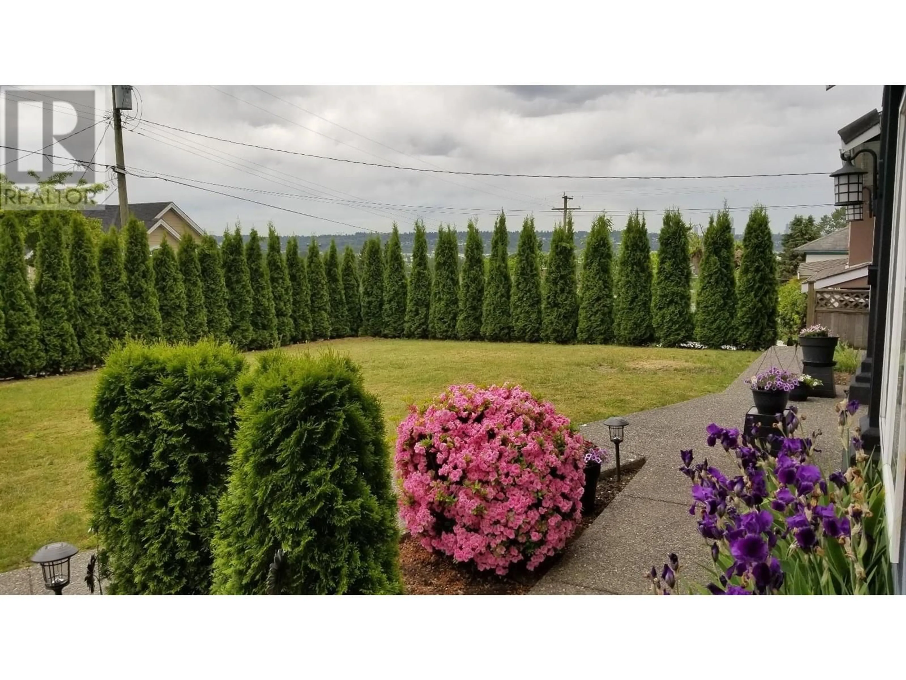 A pic from outside/outdoor area/front of a property/back of a property/a pic from drone, mountain view for 316 BEGIN ST, Coquitlam British Columbia V3K4V8