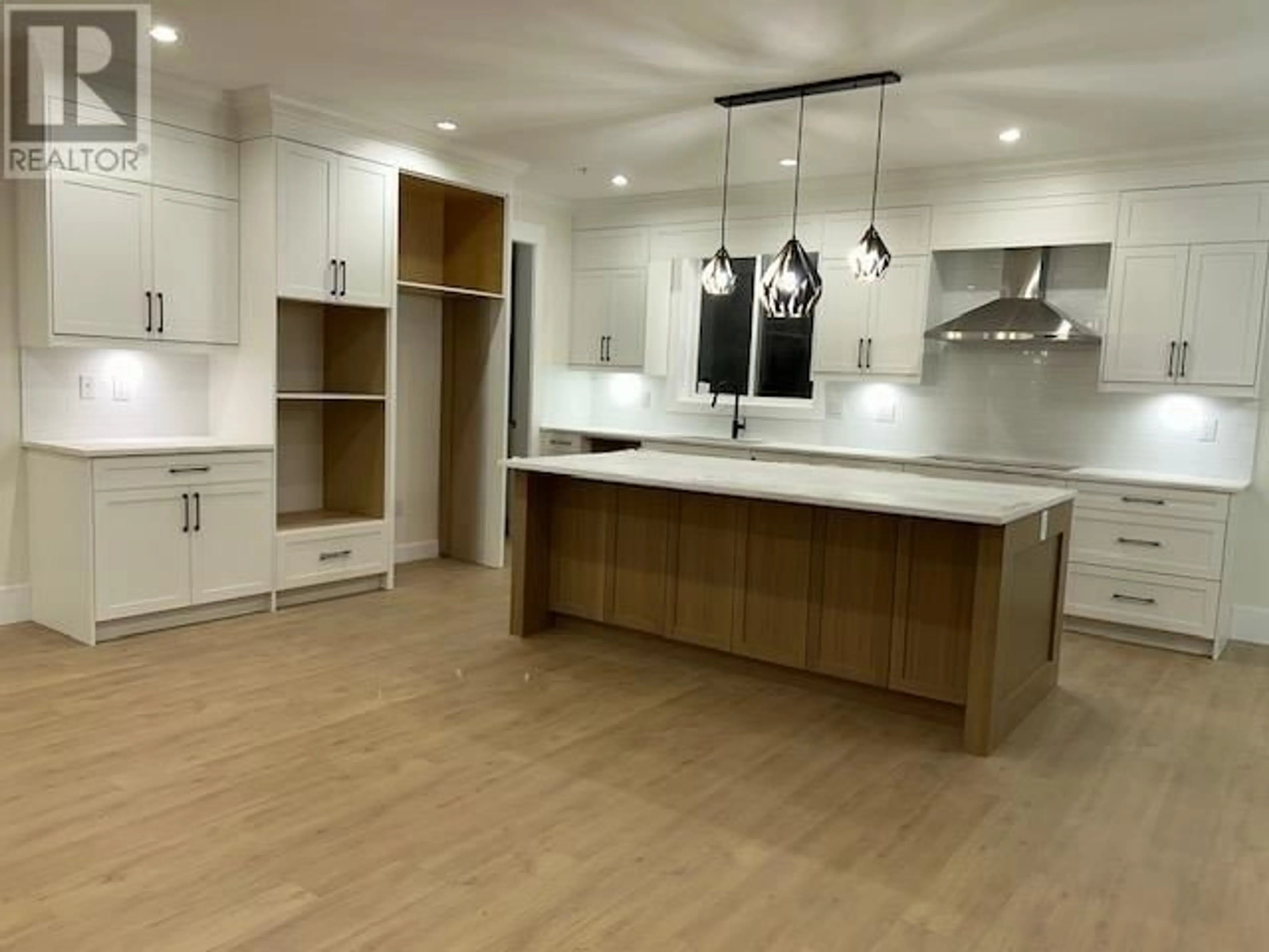 Open concept kitchen, wood/laminate floor for 11030 241A STREET, Maple Ridge British Columbia V2W0K5