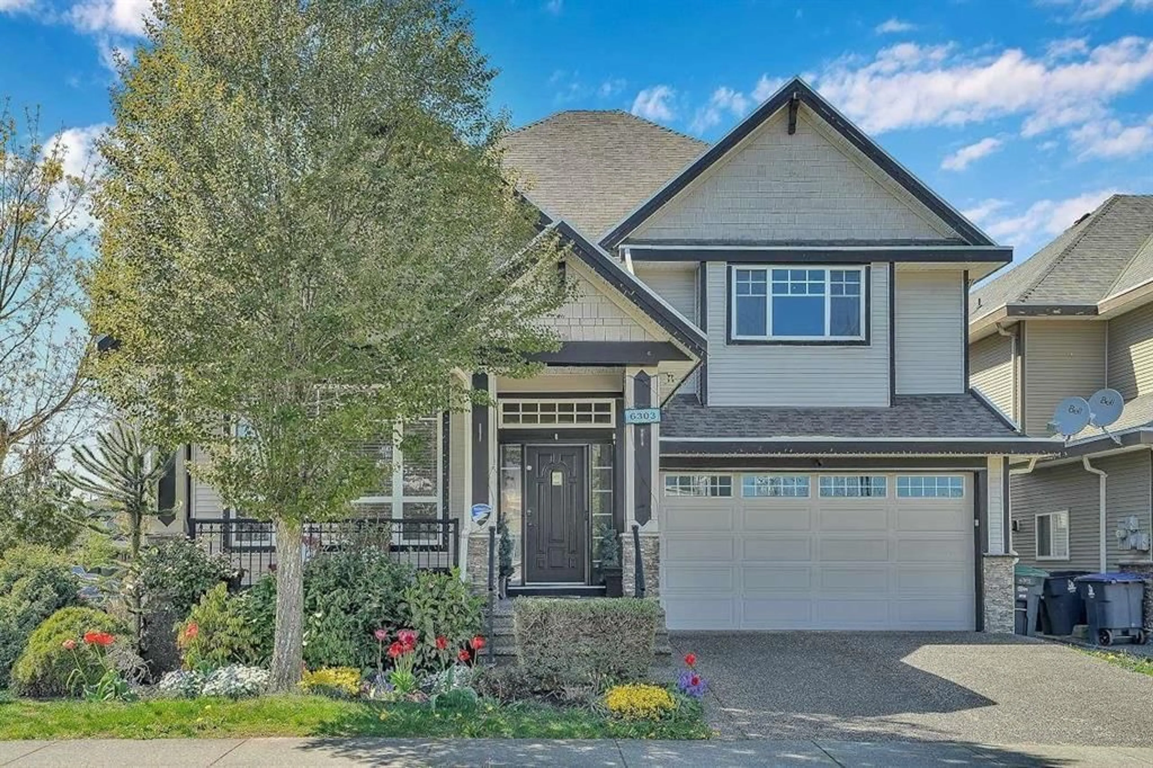 Home with vinyl exterior material, street for 6303 167B, Surrey British Columbia V3S1X3