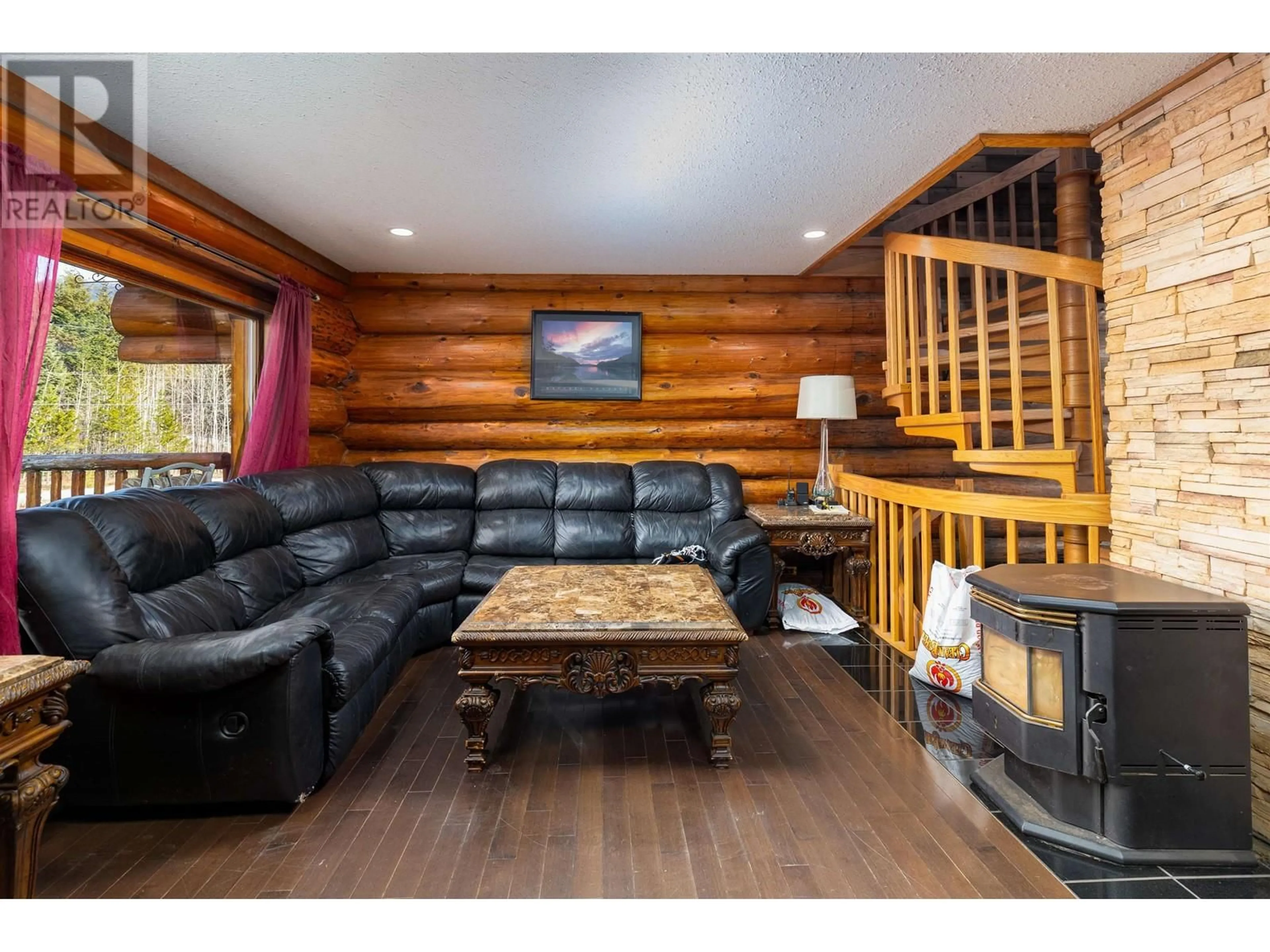 Living room with furniture, wood/laminate floor for 604 OLD LAKELSE LAKE DRIVE, Terrace British Columbia V8G0G5
