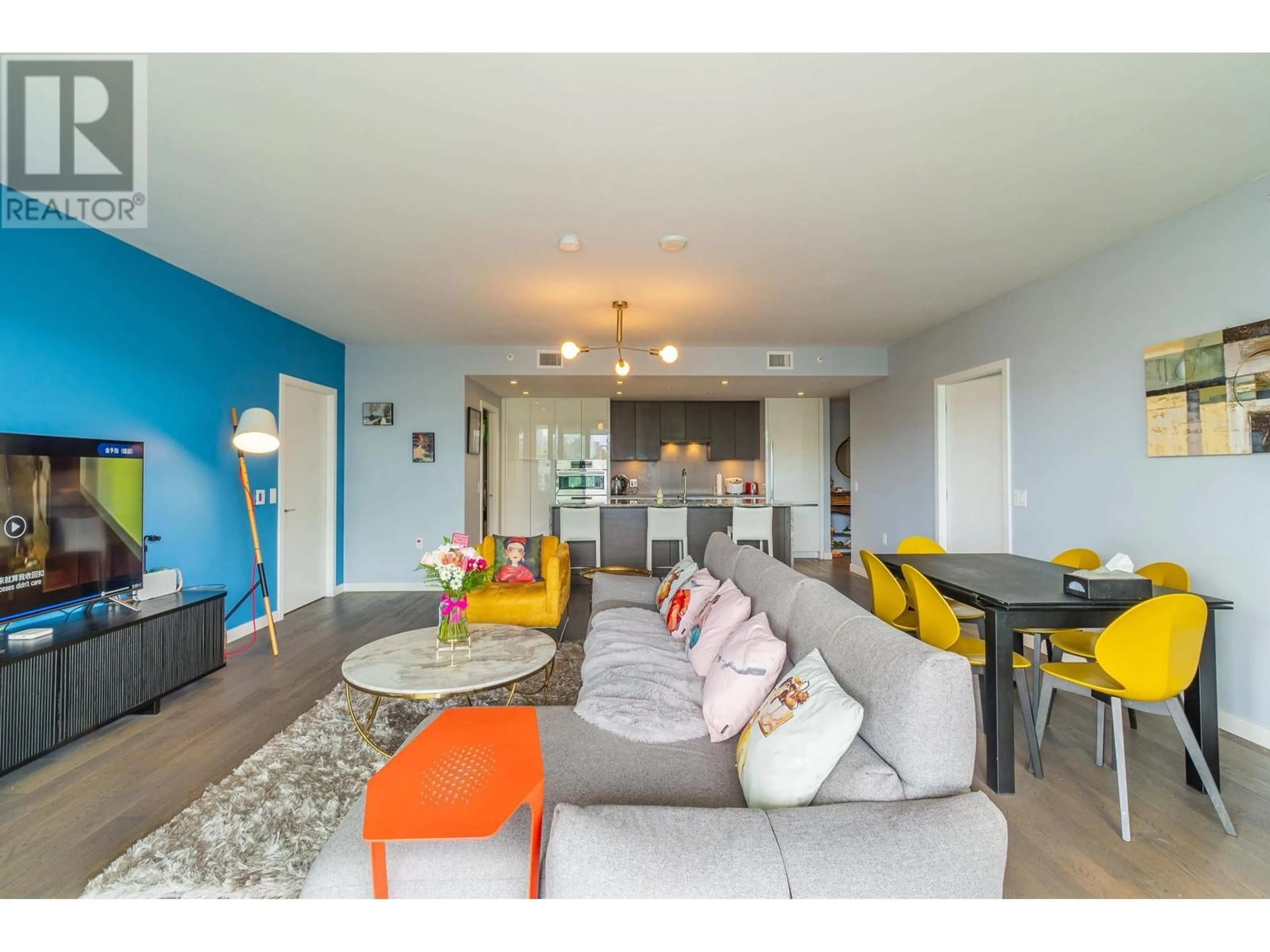 Living room with furniture, wood/laminate floor for 1106 - 1688 PULLMAN PORTER STREET, Vancouver British Columbia V6A0H3