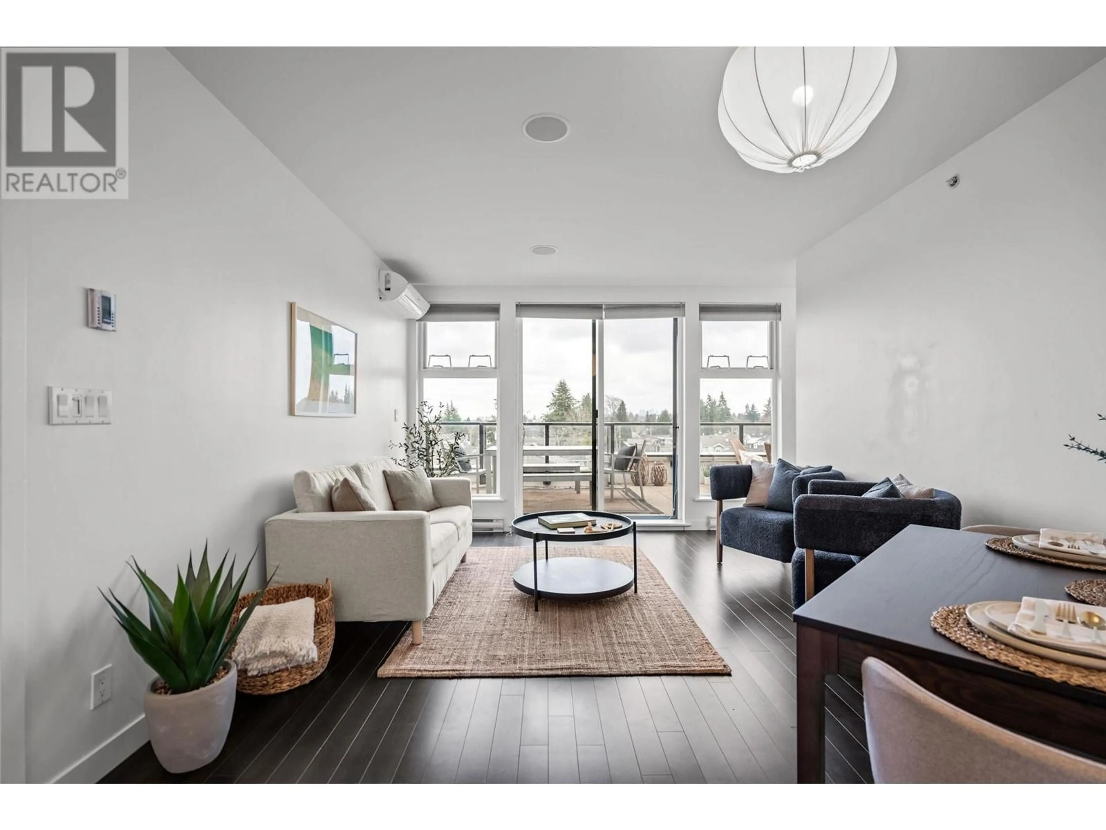 Living room with furniture, wood/laminate floor for 410 - 215 33RD AVENUE, Vancouver British Columbia V5V2Z7