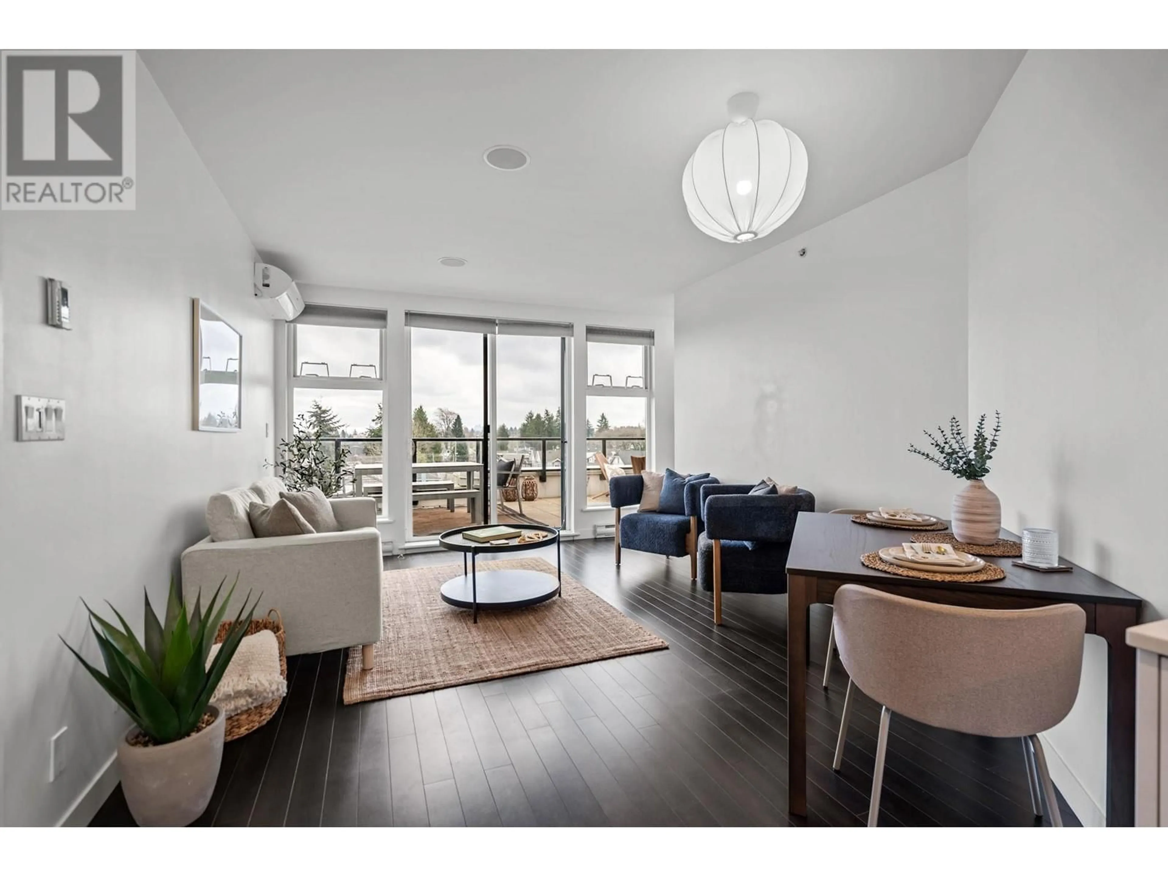 Living room with furniture, wood/laminate floor for 410 215 E 33RD AVENUE, Vancouver British Columbia V5V2Z7