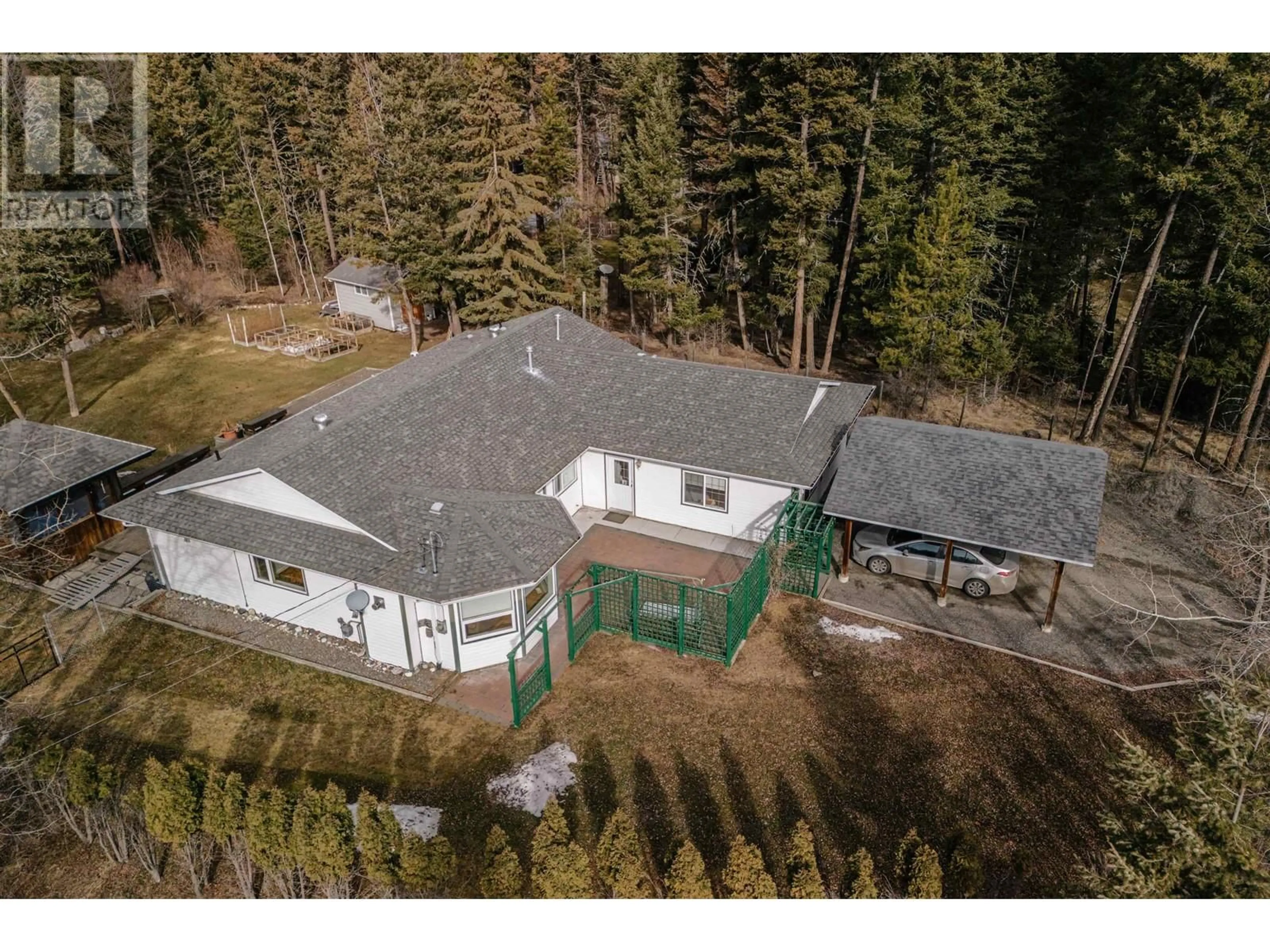 A pic from outside/outdoor area/front of a property/back of a property/a pic from drone, unknown for 5377 KALLUM DRIVE, 108 Mile Ranch British Columbia V0K2Z0