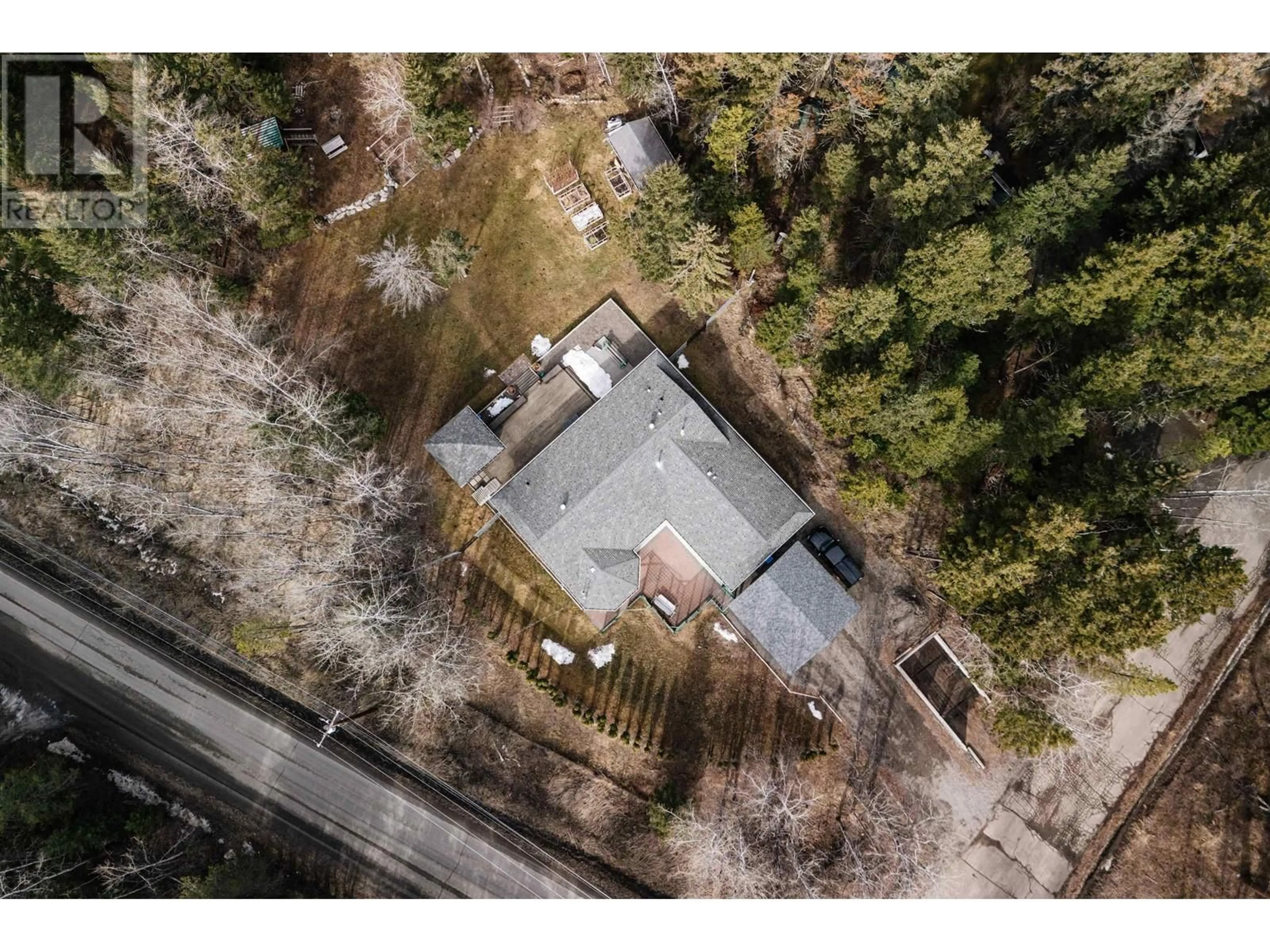 A pic from outside/outdoor area/front of a property/back of a property/a pic from drone, unknown for 5377 KALLUM DRIVE, 108 Mile Ranch British Columbia V0K2Z0