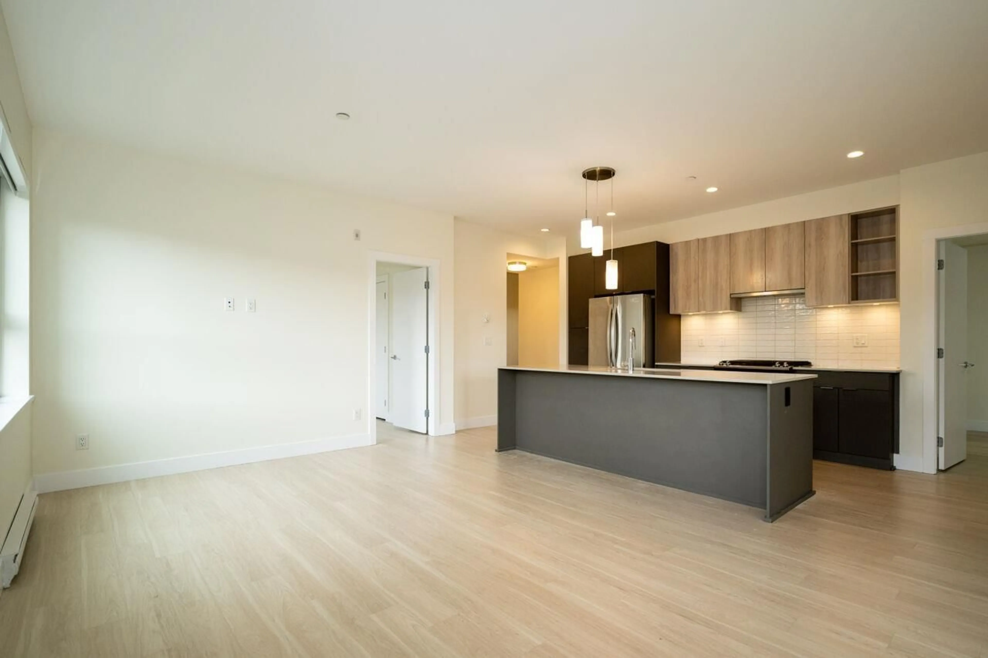 Open concept kitchen, wood/laminate floor for 217 - 6950 NICHOLSON, Delta British Columbia V4E0A8