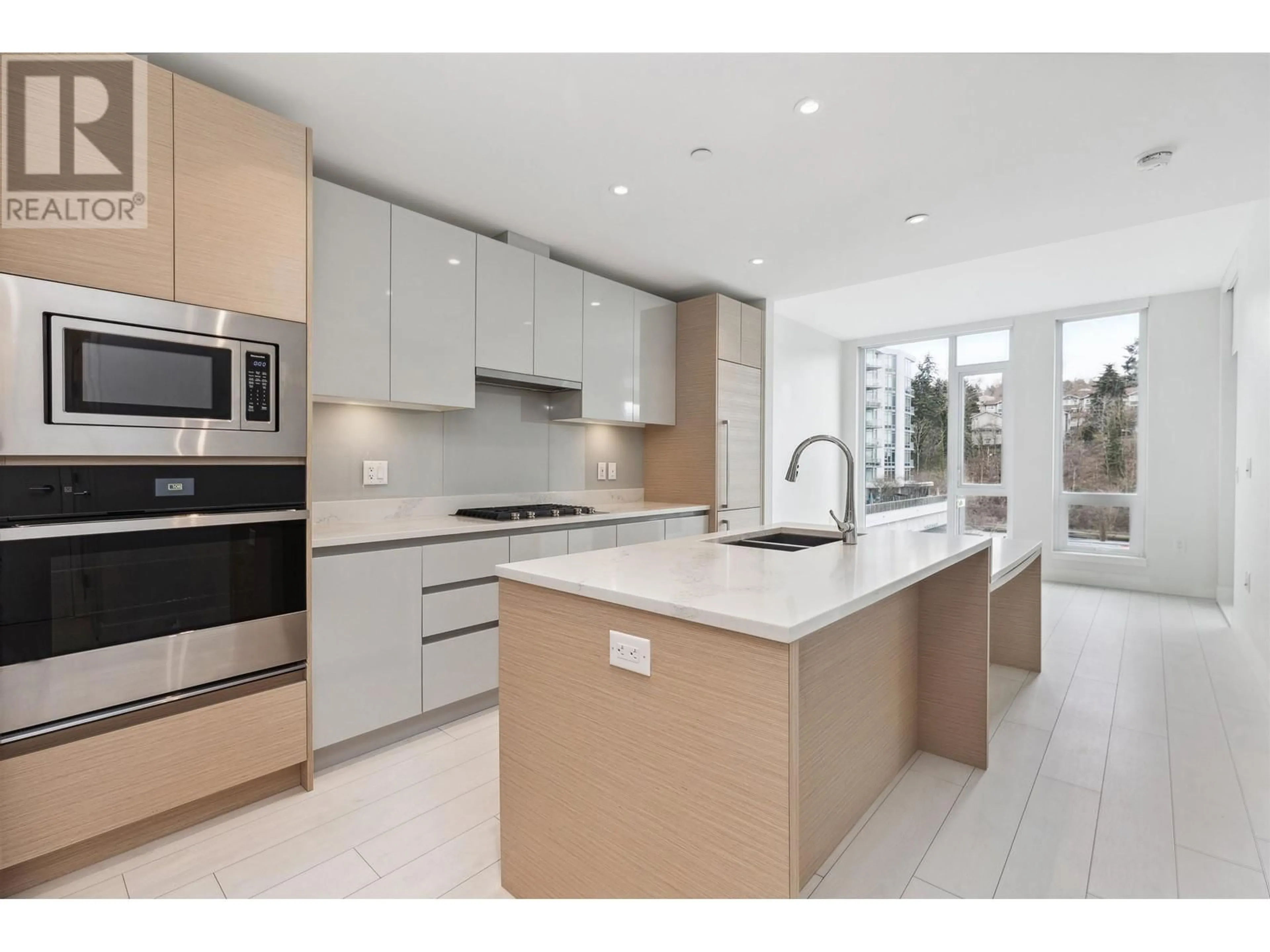 Open concept kitchen, ceramic/tile floor for 511 3538 SAWMILL CRESCENT, Vancouver British Columbia V5S0J8