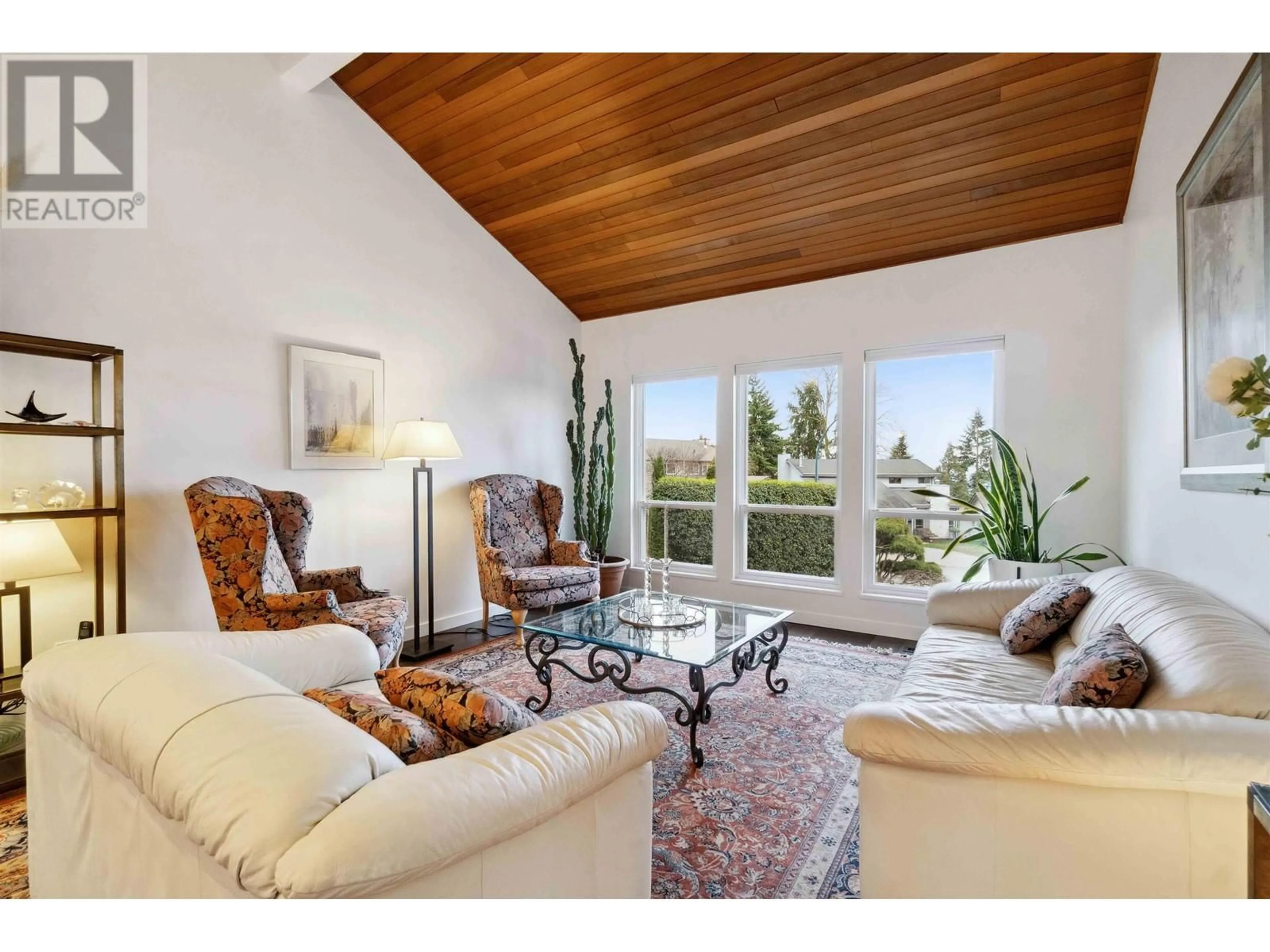 Living room with furniture, wood/laminate floor for 1613 HEMLOCK PLACE, Port Moody British Columbia V3H4A7