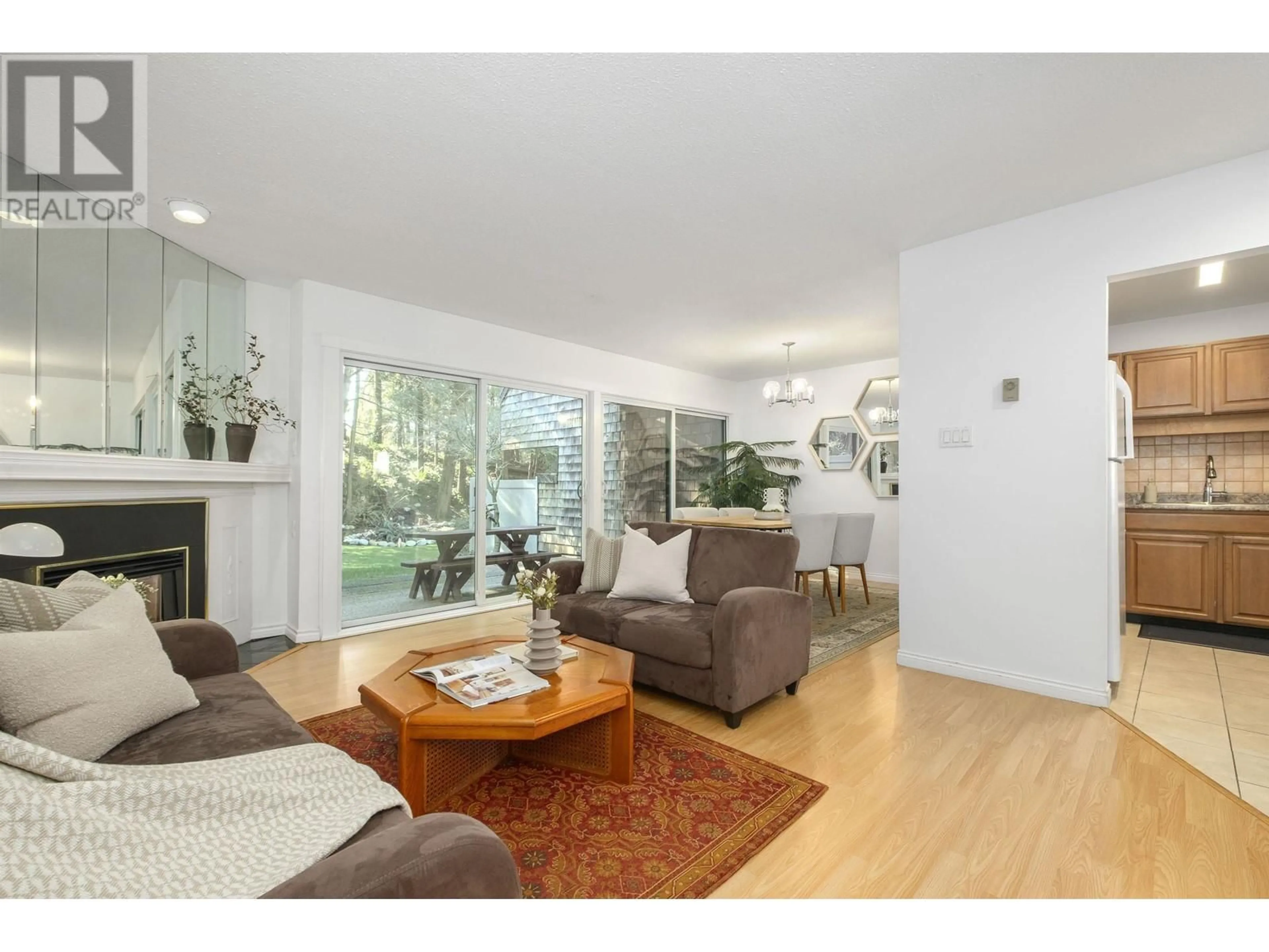 Living room with furniture, wood/laminate floor for 9828 BELFRIAR DRIVE, Burnaby British Columbia V3N4N1