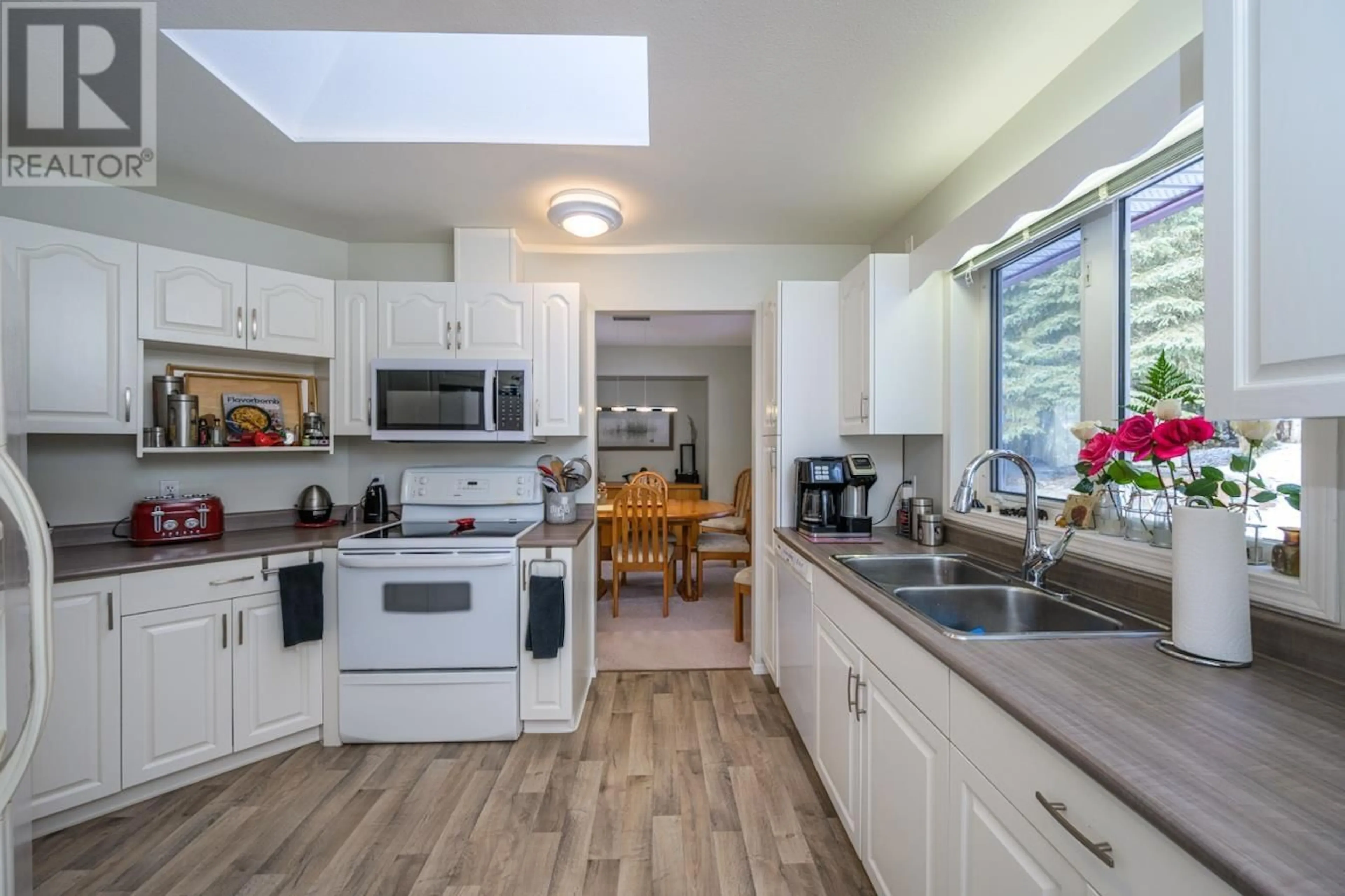 Open concept kitchen, ceramic/tile floor for 9142 NORTH NECHAKO ROAD, Prince George British Columbia V2K4Z9