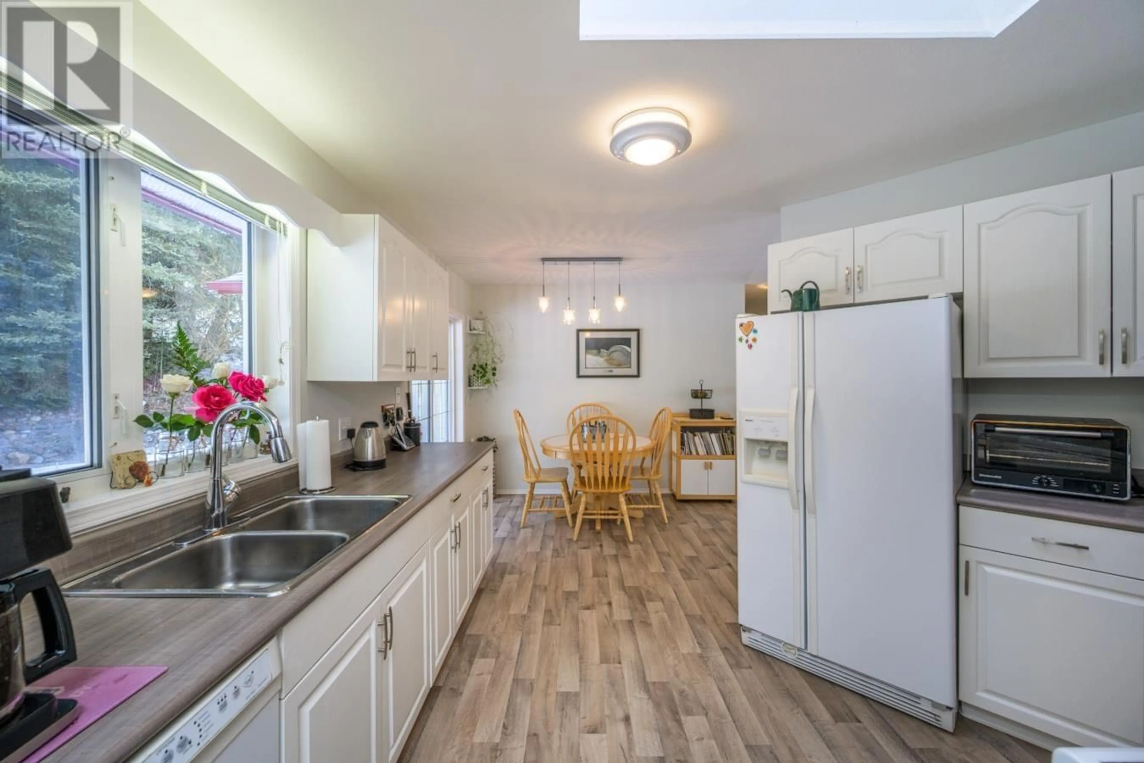 Open concept kitchen, ceramic/tile floor for 9142 NORTH NECHAKO ROAD, Prince George British Columbia V2K4Z9