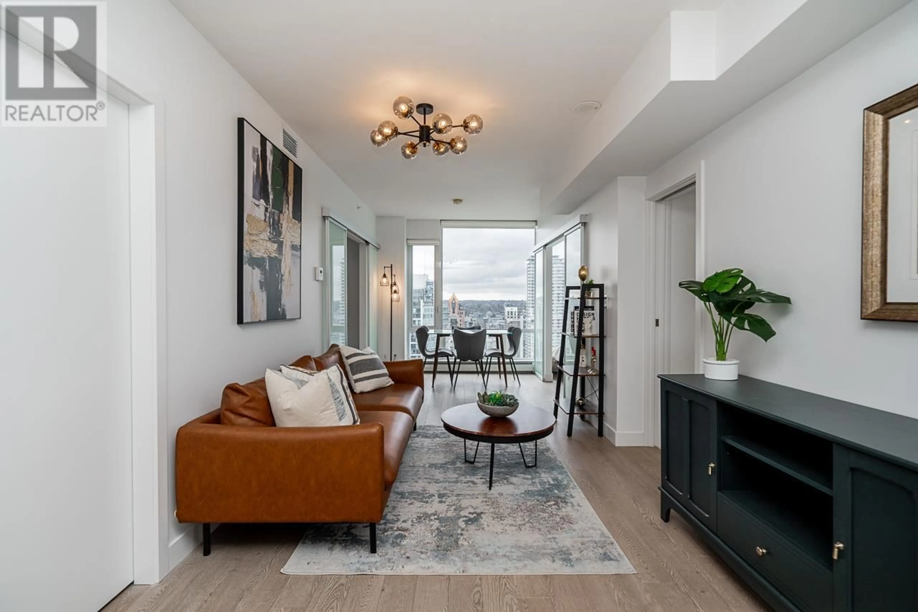 Living room with furniture, unknown for 3105 - 1283 HOWE STREET, Vancouver British Columbia V6Z0E3