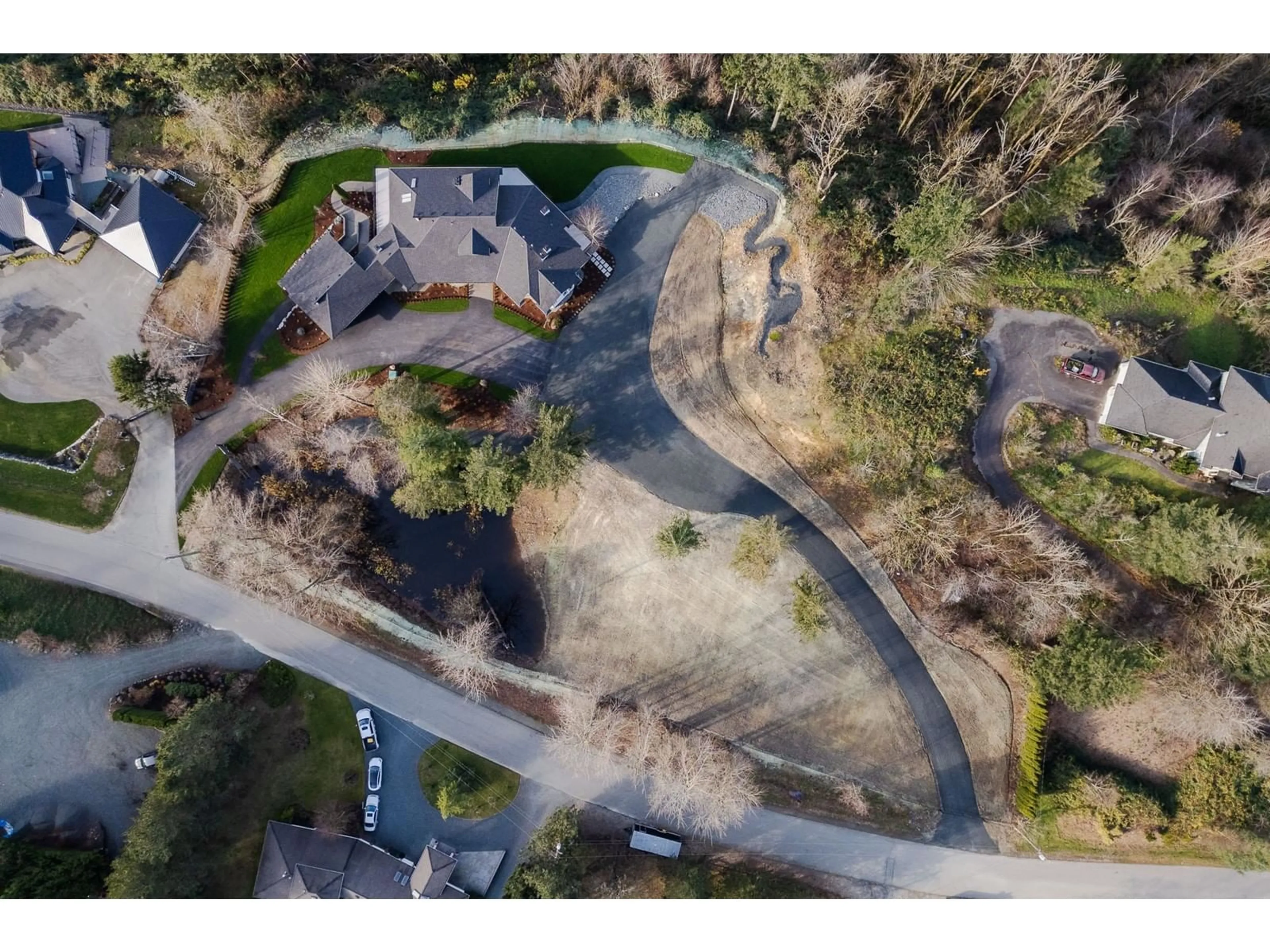 A pic from outside/outdoor area/front of a property/back of a property/a pic from drone, street for 41965 NIKADA DRIVE, Chilliwack British Columbia V2R5H2