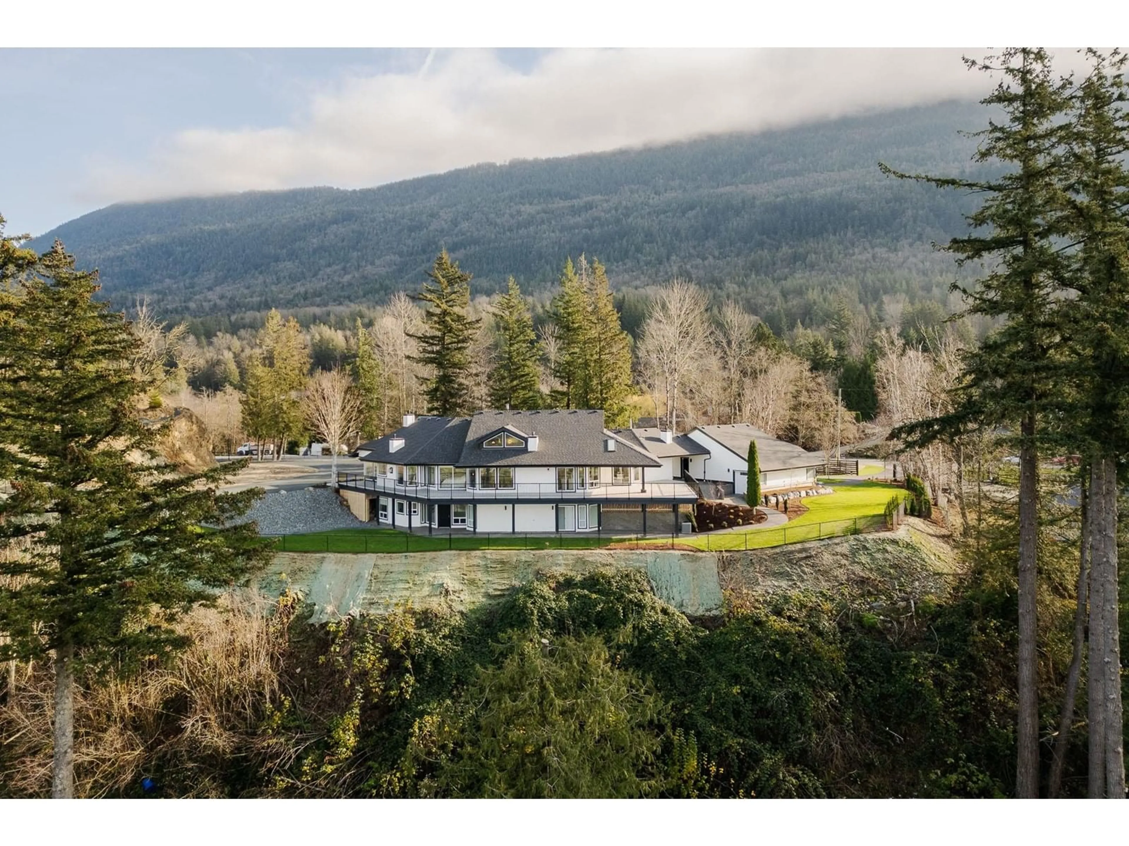 A pic from outside/outdoor area/front of a property/back of a property/a pic from drone, mountain view for 41965 NIKADA DRIVE, Chilliwack British Columbia V2R5H2